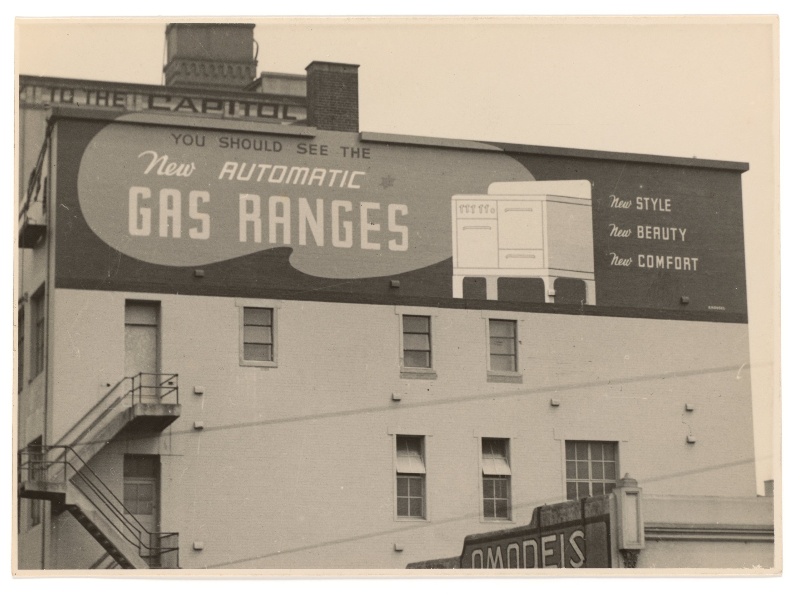Photograph of billboard advertising gas ovens
