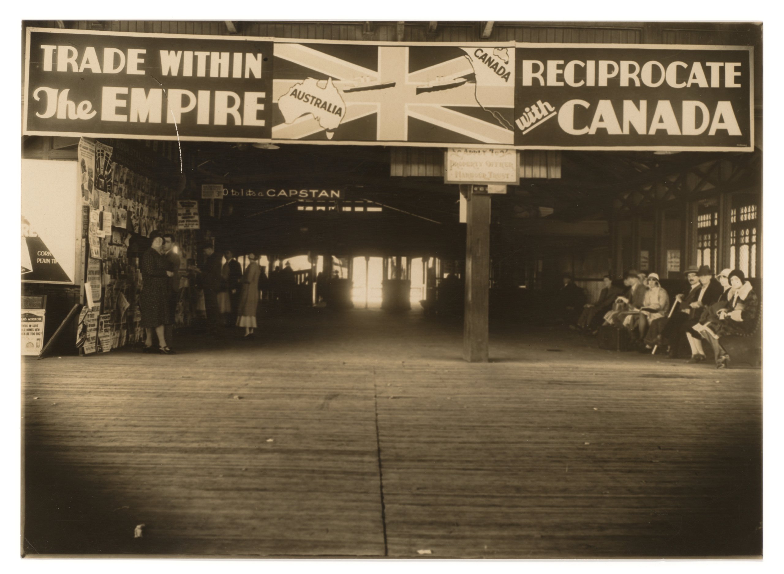 Photograph of billboard at Circular Quay Wharf promoting trade between Australia and Canada