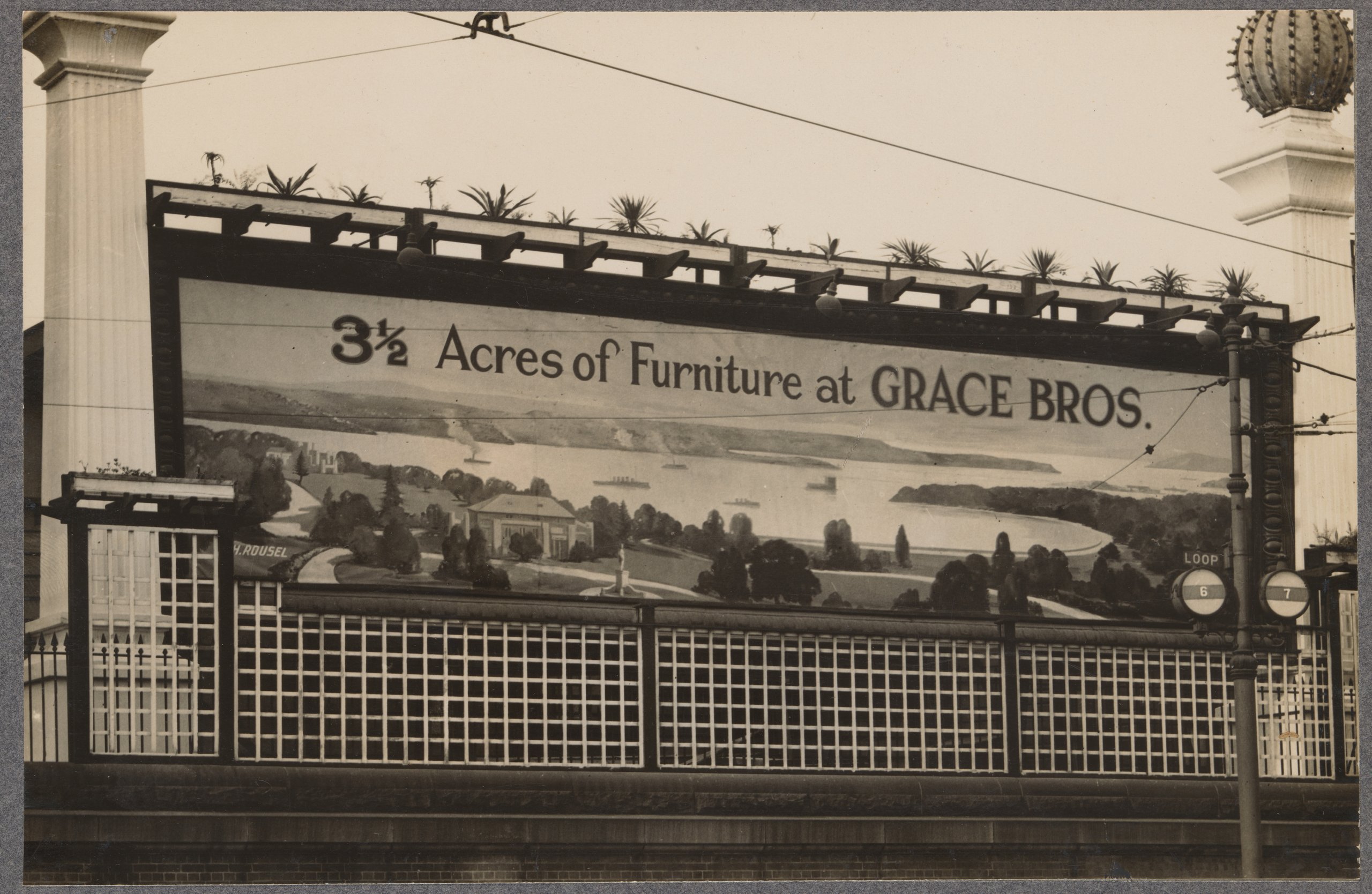 Photograph of advertising billboard for Grace Bros advertising furniture