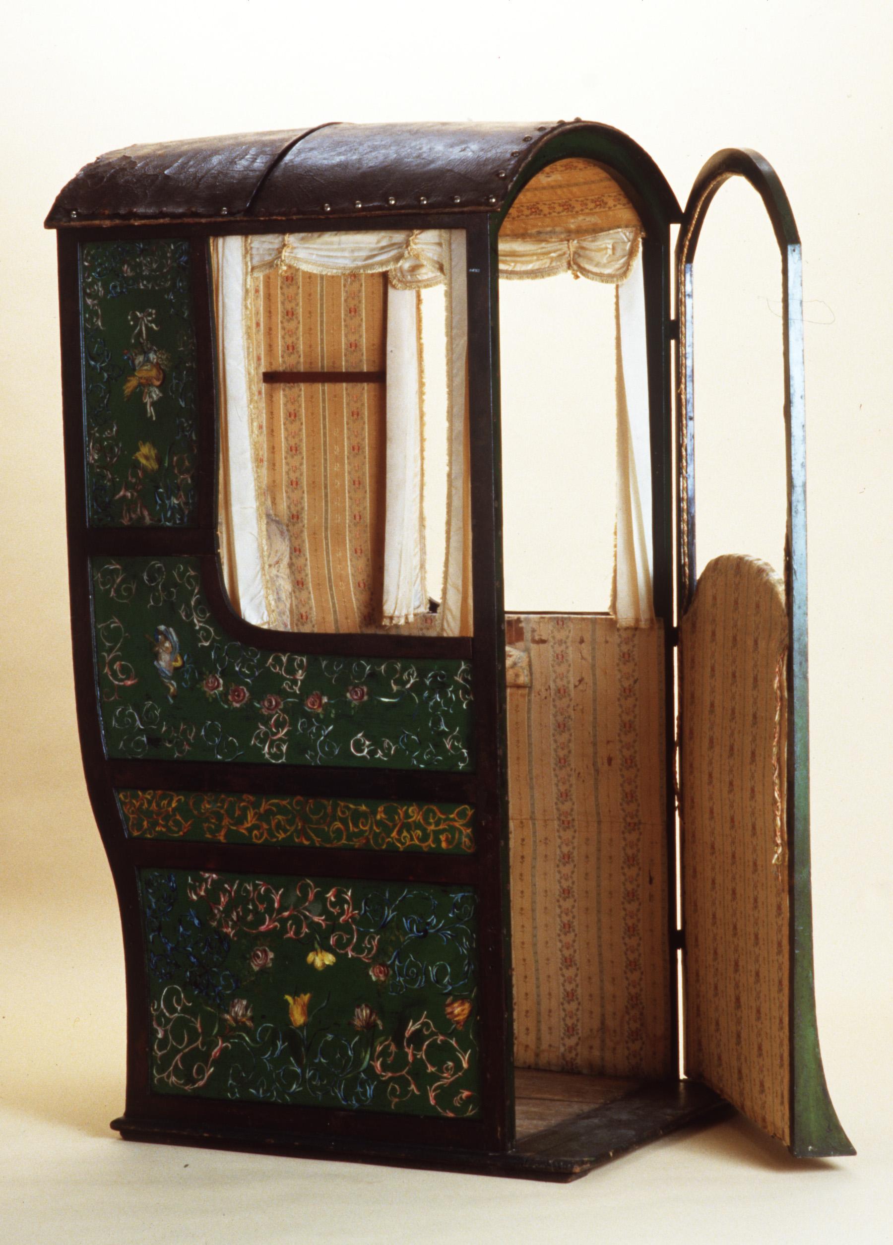 Sedan chair used as telephone box owned by F A P Hyland