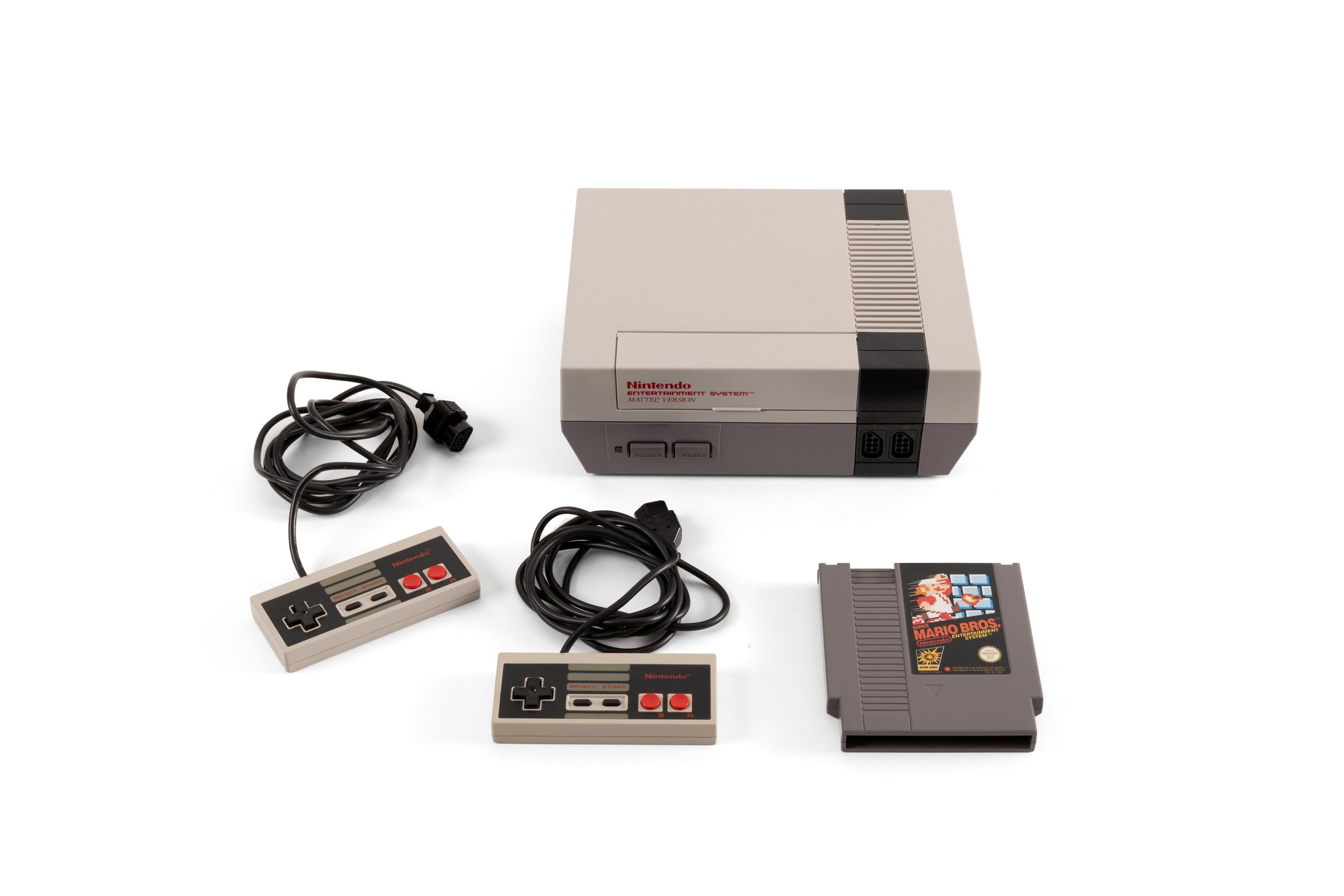 'NES' video game console with accessories and packaging by Nintendo Co Ltd