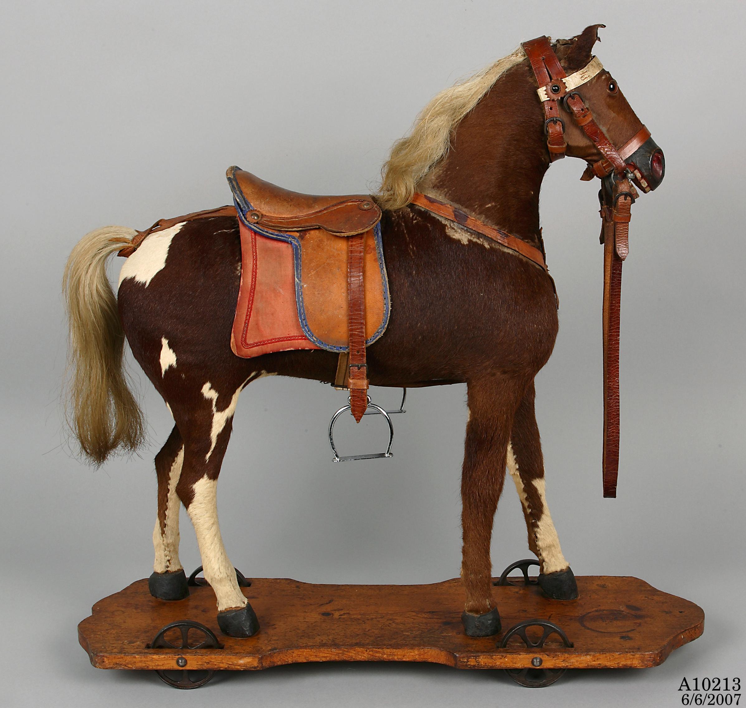 Pull along toy horse