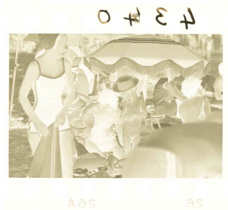 Negative of people at the beach in Sydney photographed by David Mist