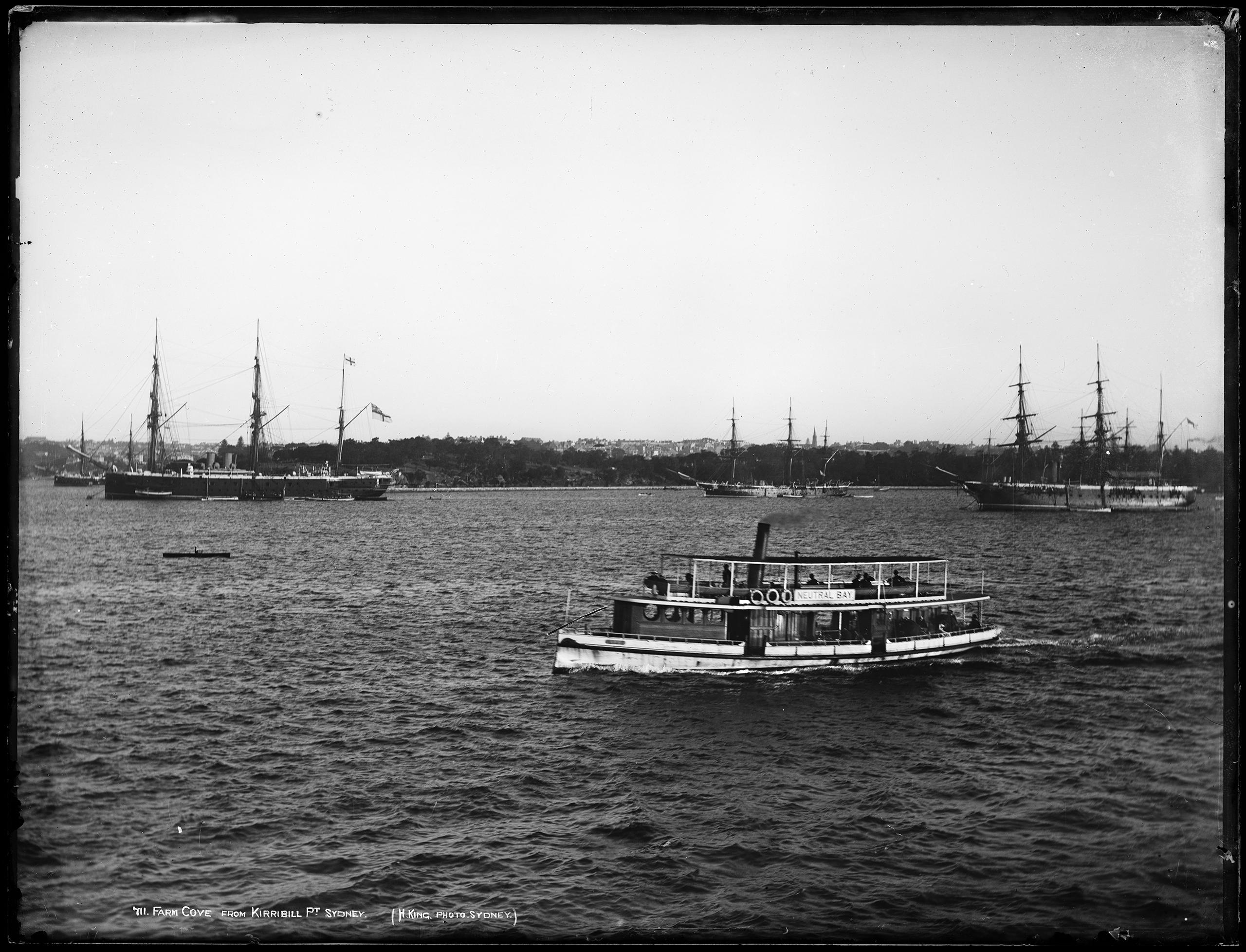 Glass plate negative of steam ferry 'Lily' and HMS 'Nelson', Farm Cove, Sydney, 1882-8
