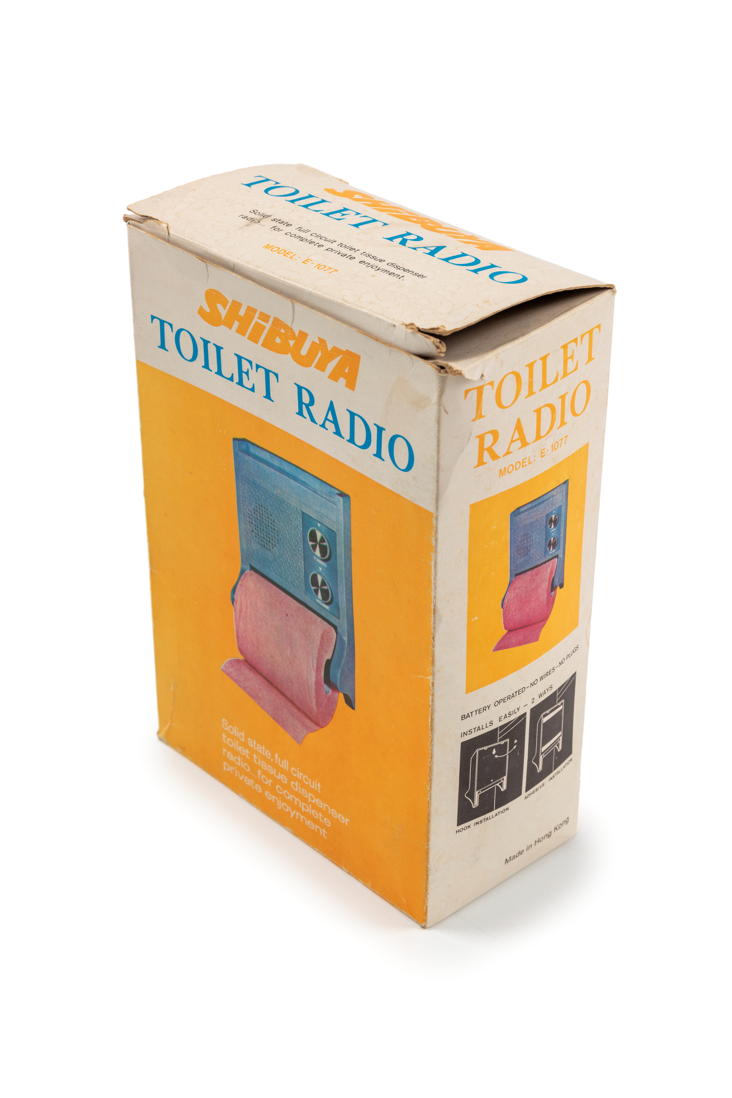 Radio with toilet roll holder