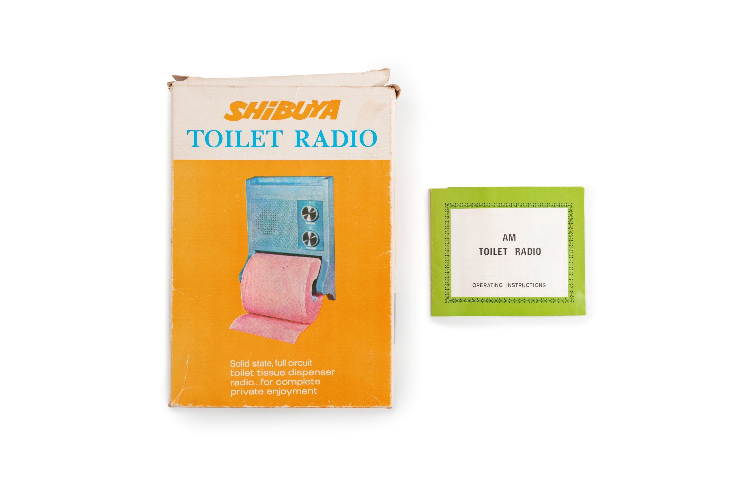 Radio with toilet roll holder