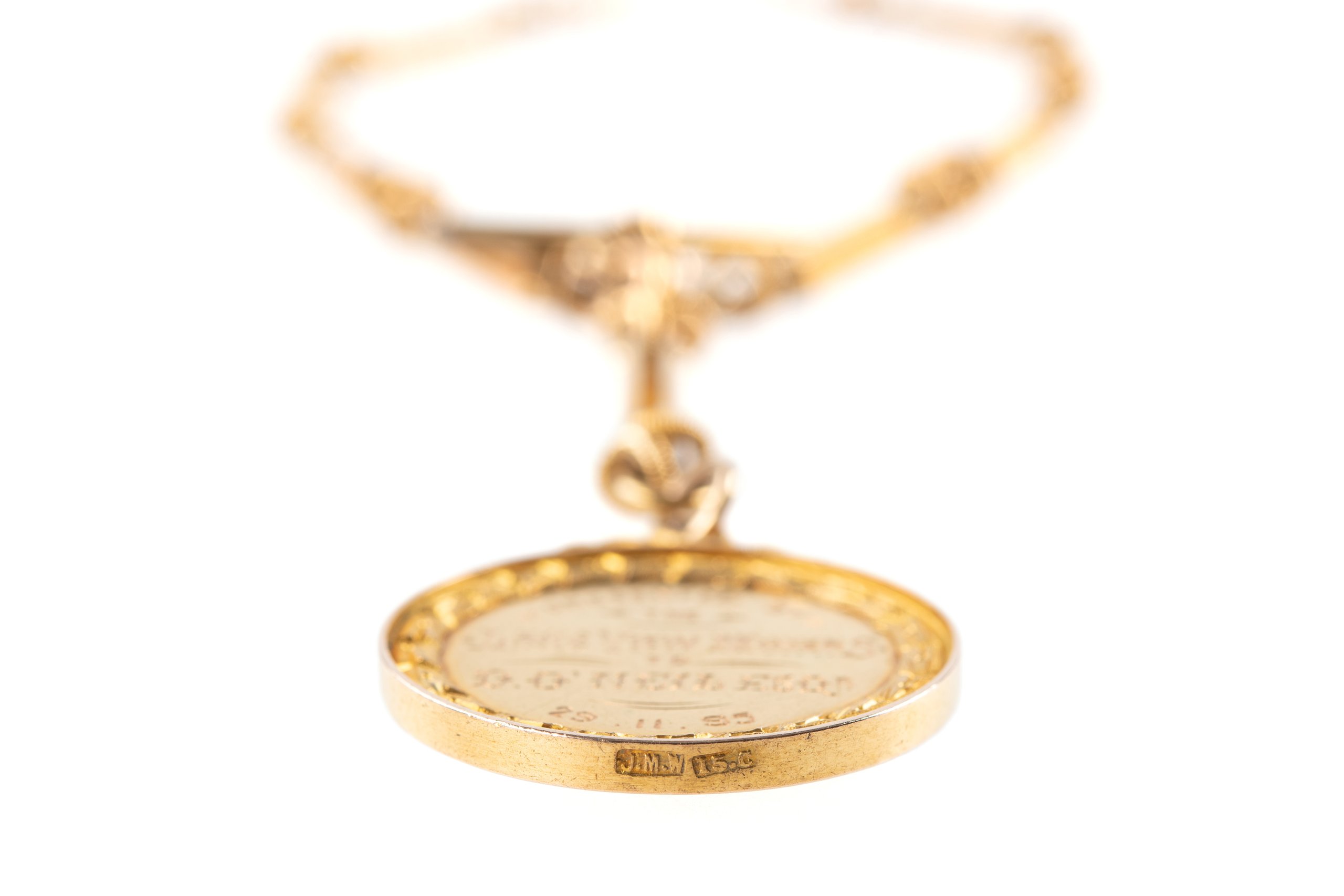 Gold fob and chain by J M Wendt