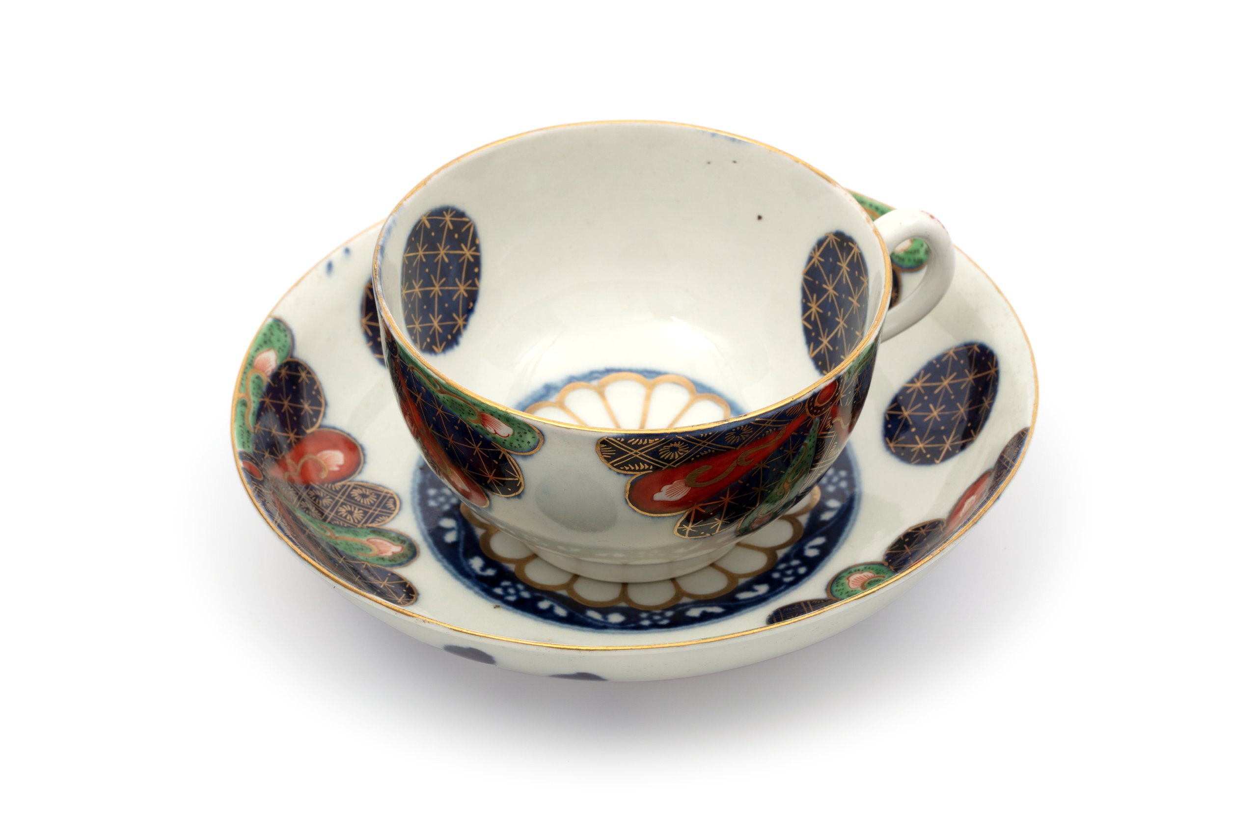 Tea cup and saucer with Imari pattern by Worcester Porcelains