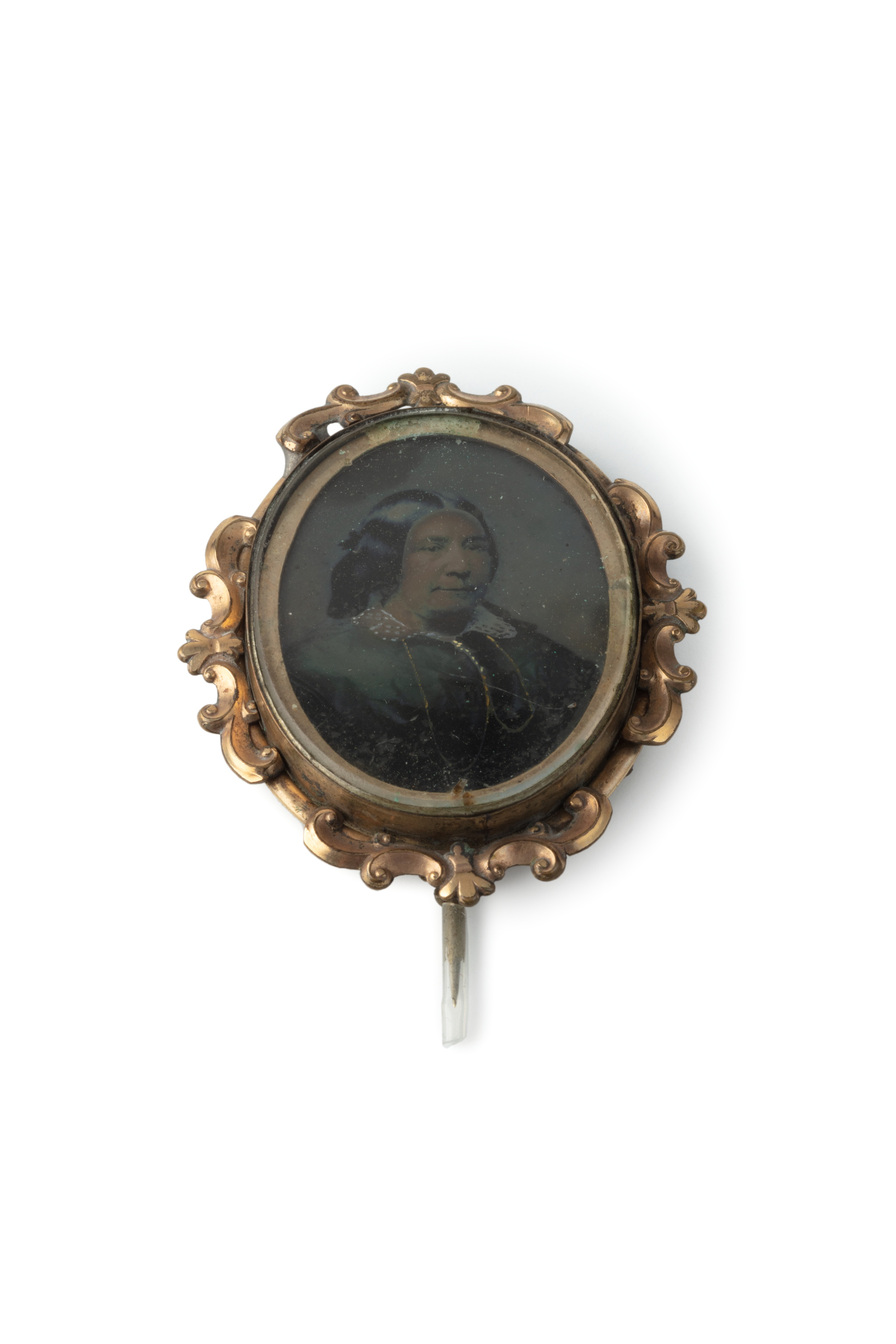 Brooch containing ambrotype studio portrait of a woman
