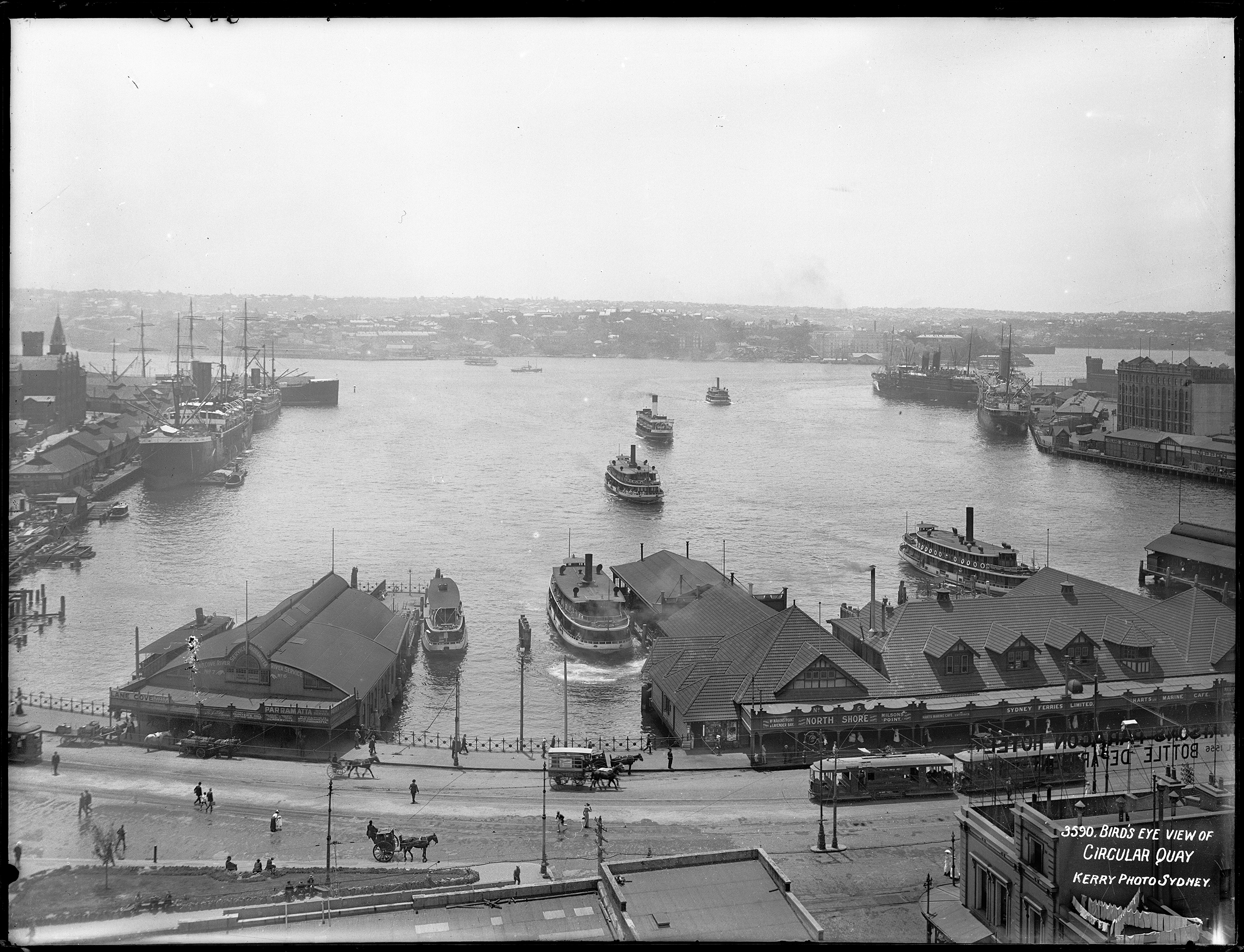 Glass negative of Sydney's Circular Quay showing ferries, ferry wharves, ocean liners, trams and hansom cabs, 1906-1910