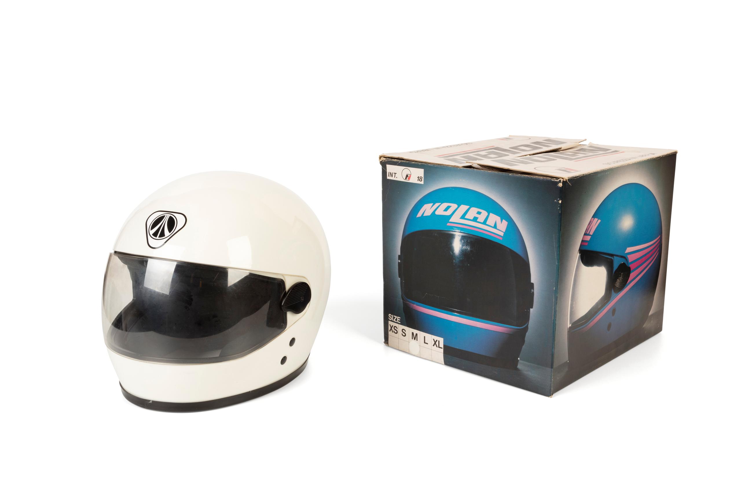 Powerhouse Collection - 'Nolan' motorcycle crash helmet with packaging by  Nolan SPA, 1975-1985