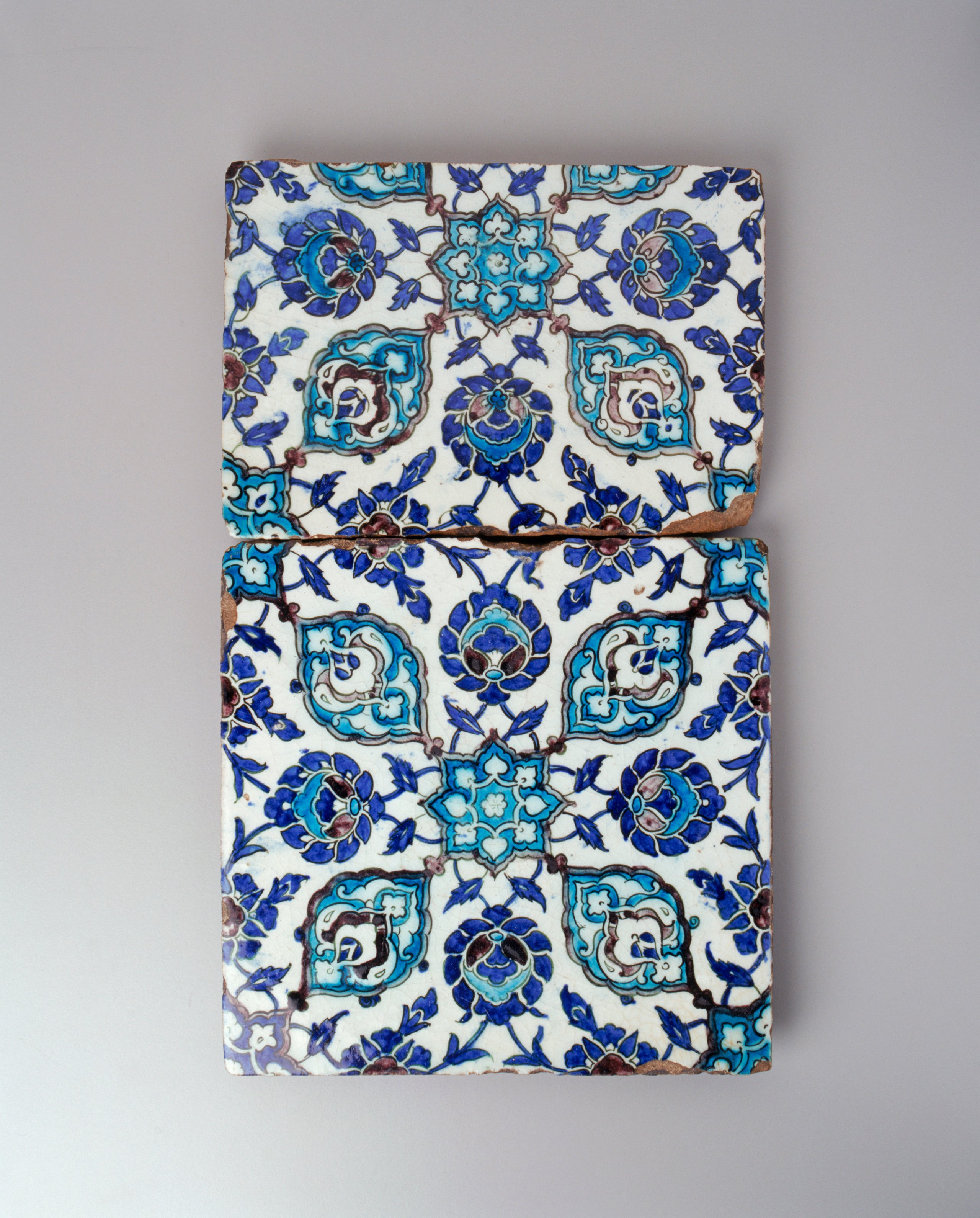 A pair of earthenware tiles from Damascus, Syria