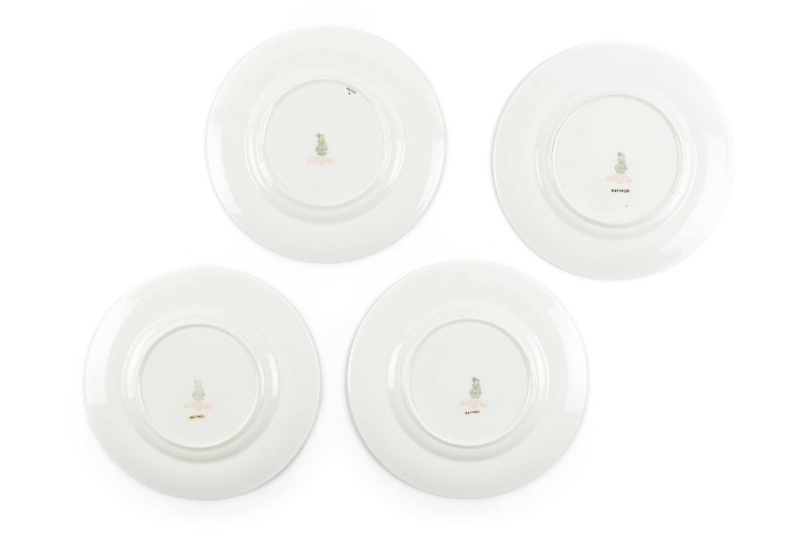 Dinner plates designed by Percy Curnock for Royal Doulton