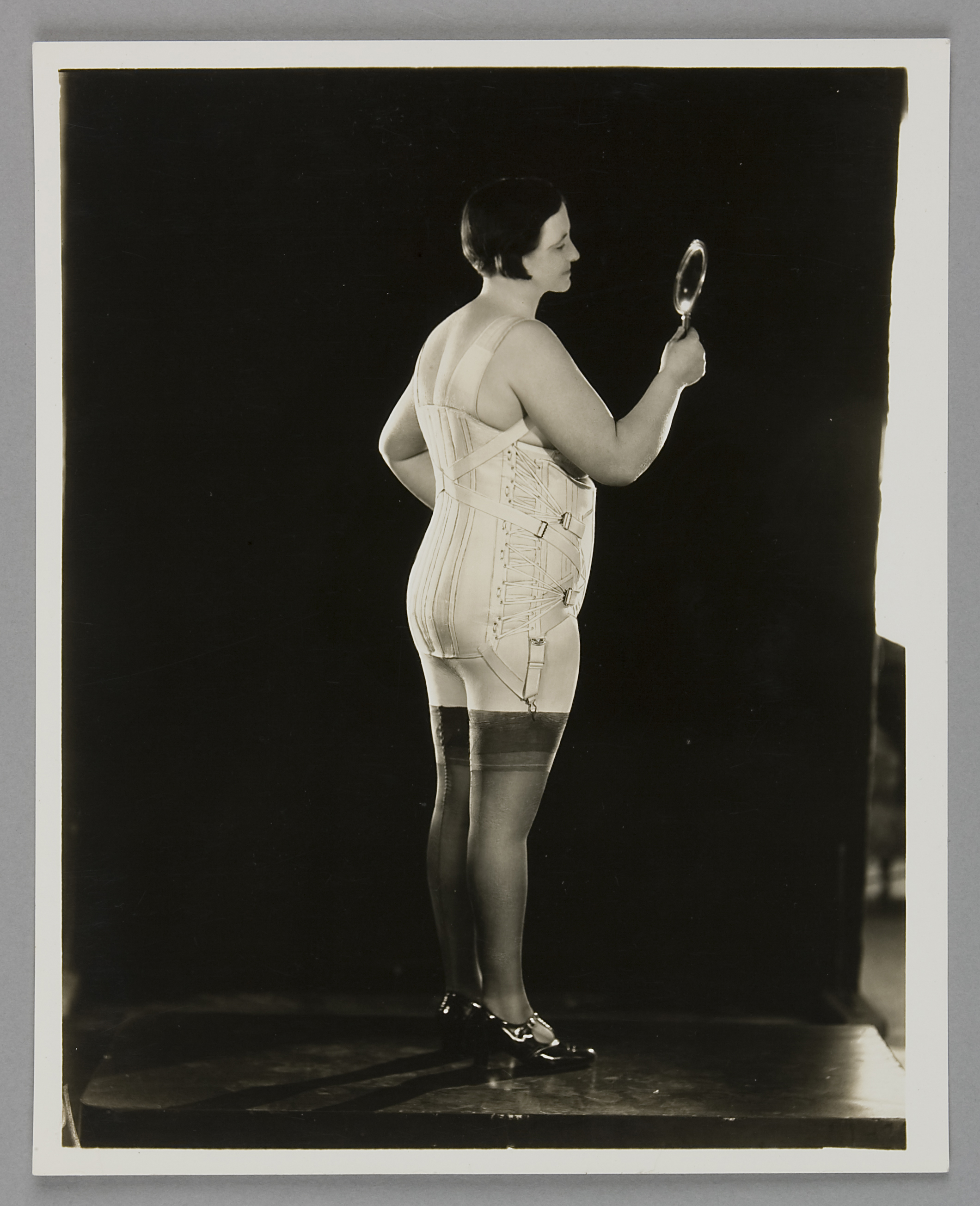 Photograph of a model wearing a Berlei corset