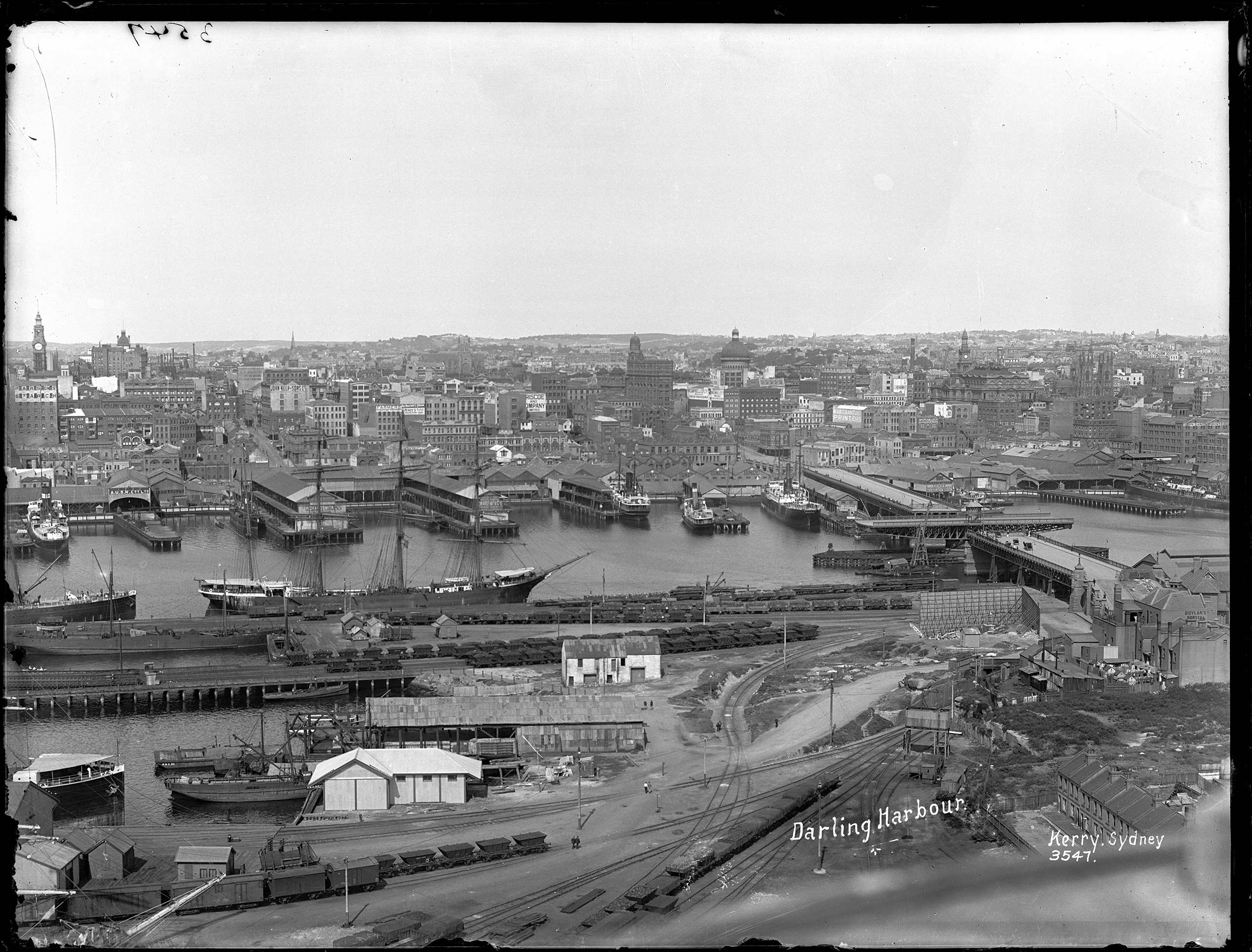 Glass plate negative, entitled "Darling Harbour" depicting Prymont Bridge and railway goods yard, Sydney