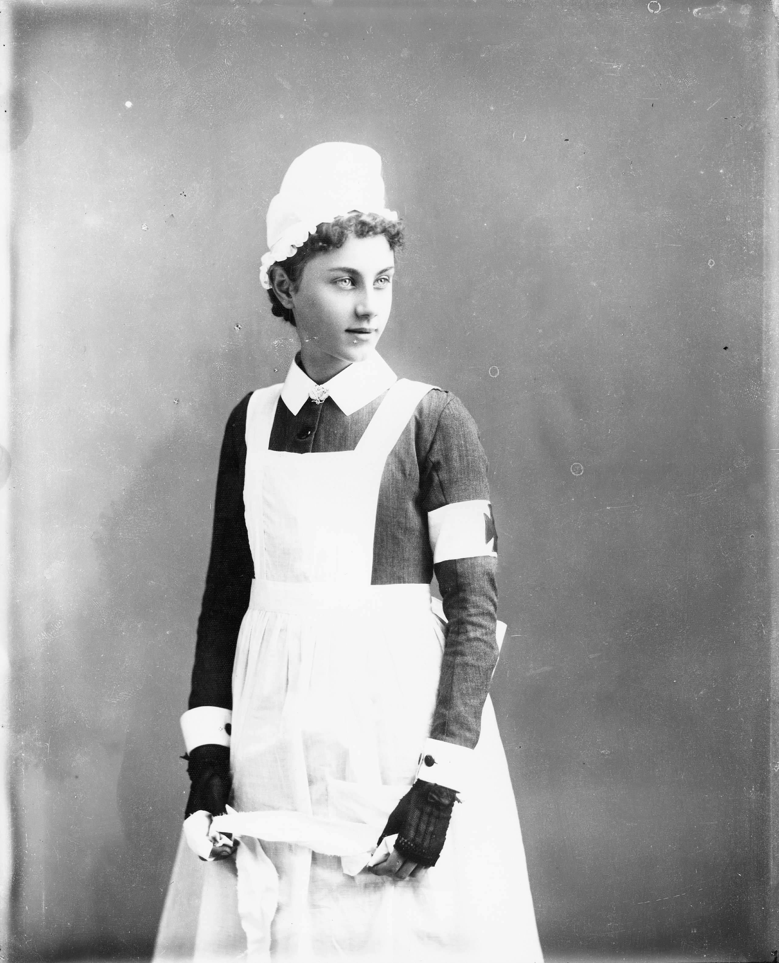'Young Girl in Red Cross Uniform' from the Tyrrell Collection