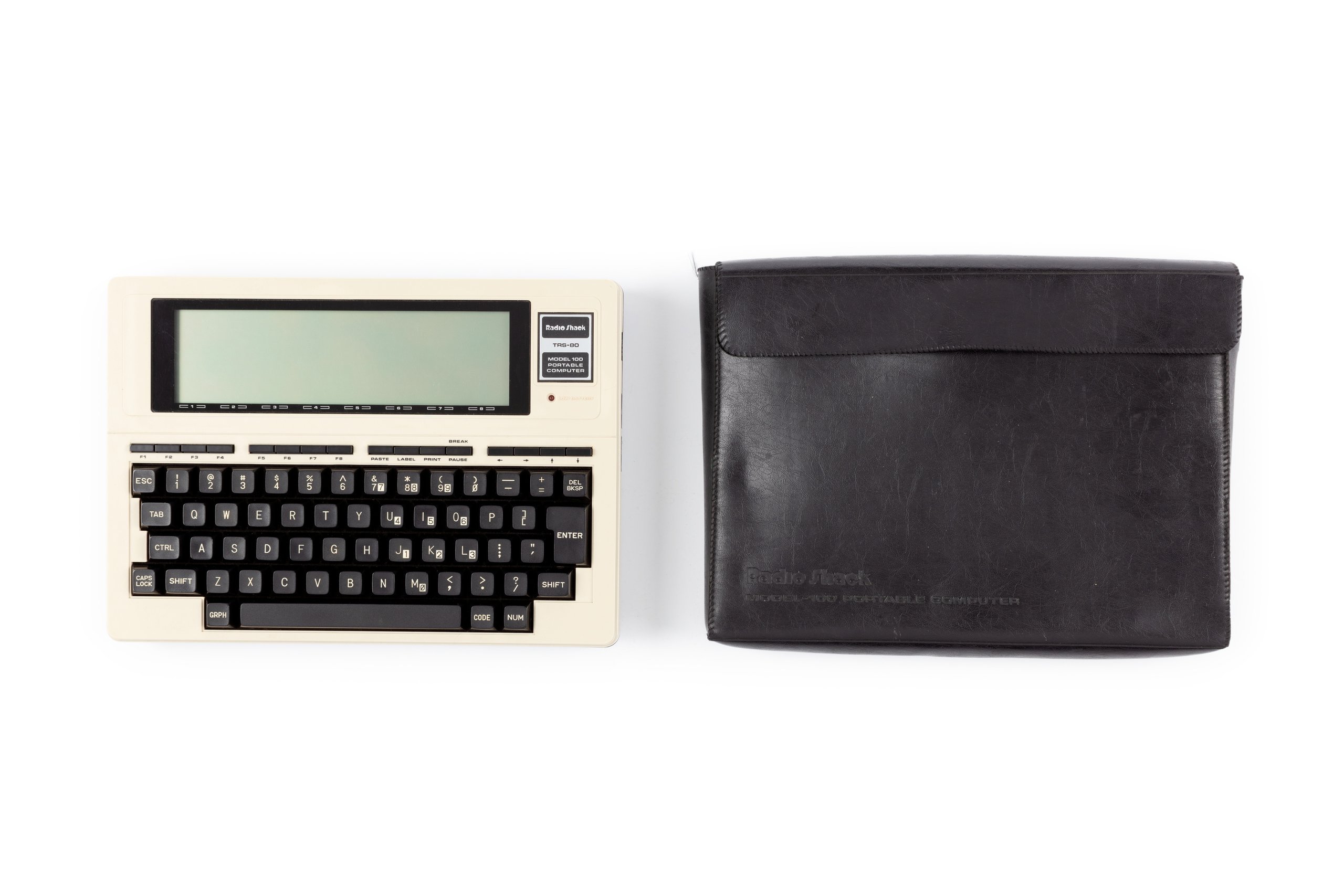 Portable computer and accessories by Tandy Corporation