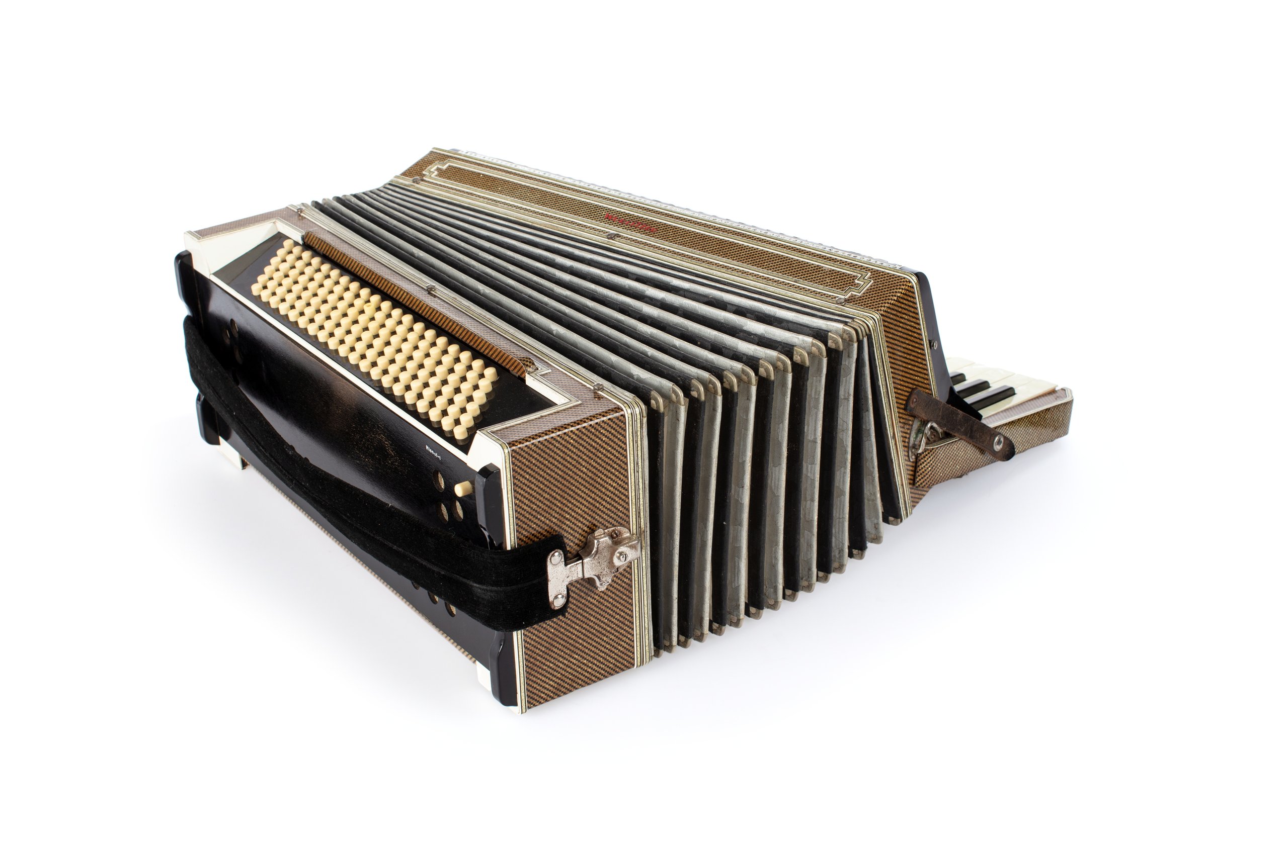 Piano accordion with case and strap made by Wurlitzer