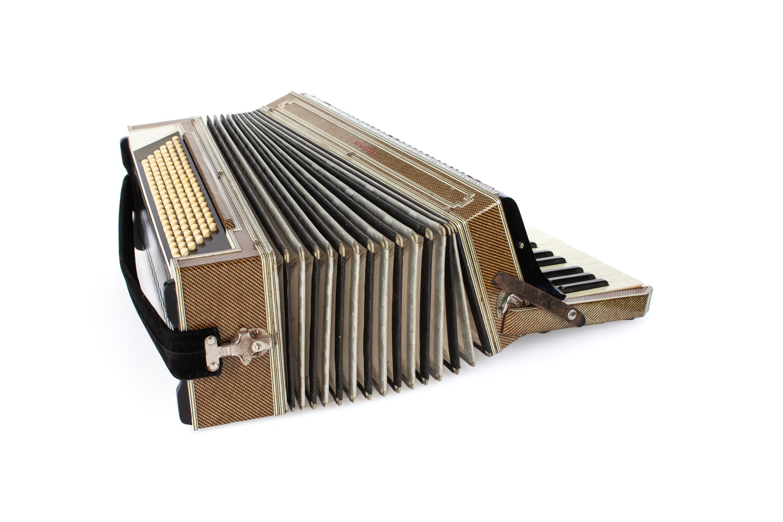 Piano accordion with case and strap made by Wurlitzer