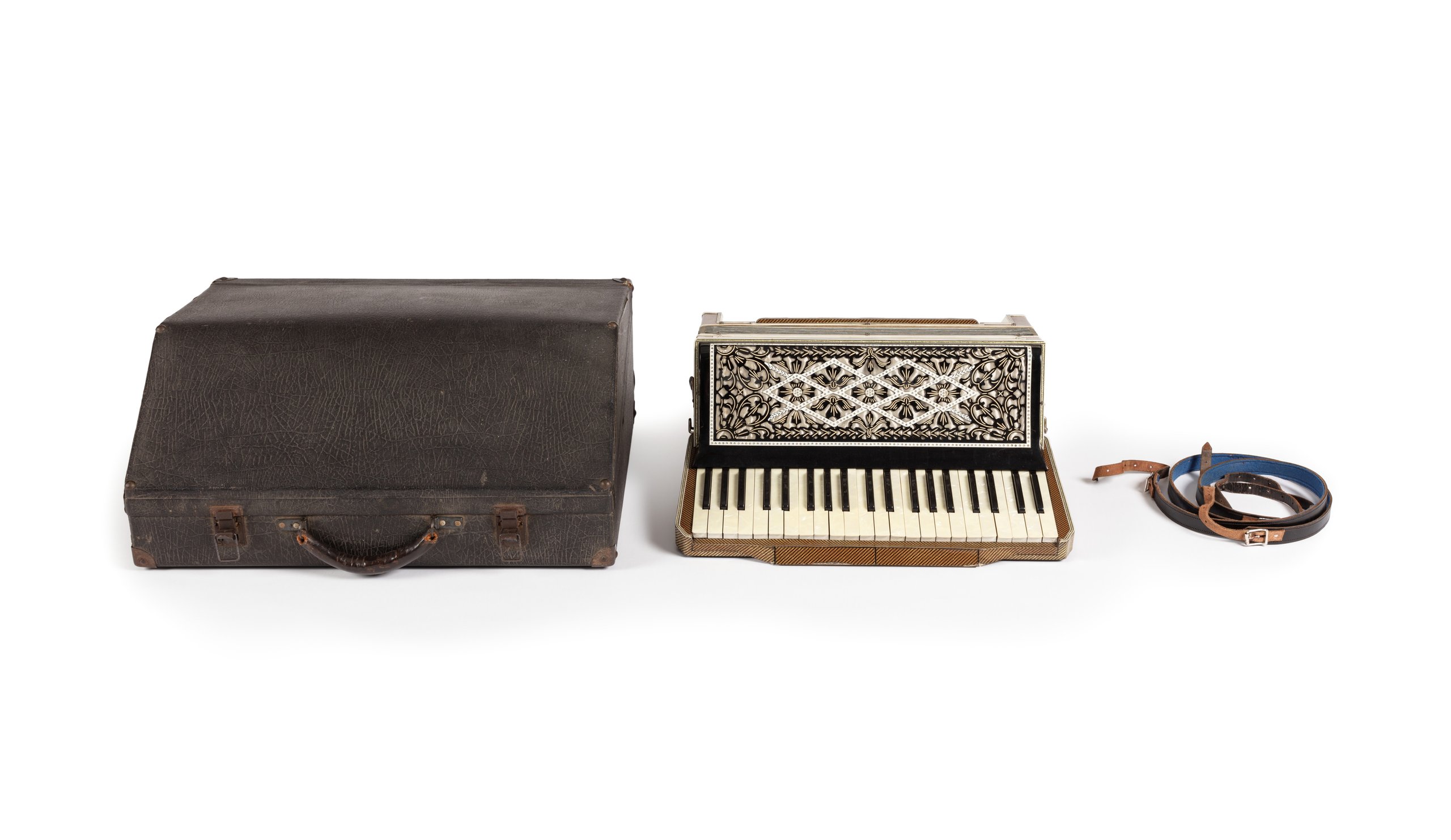 Piano accordion with case and strap made by Wurlitzer