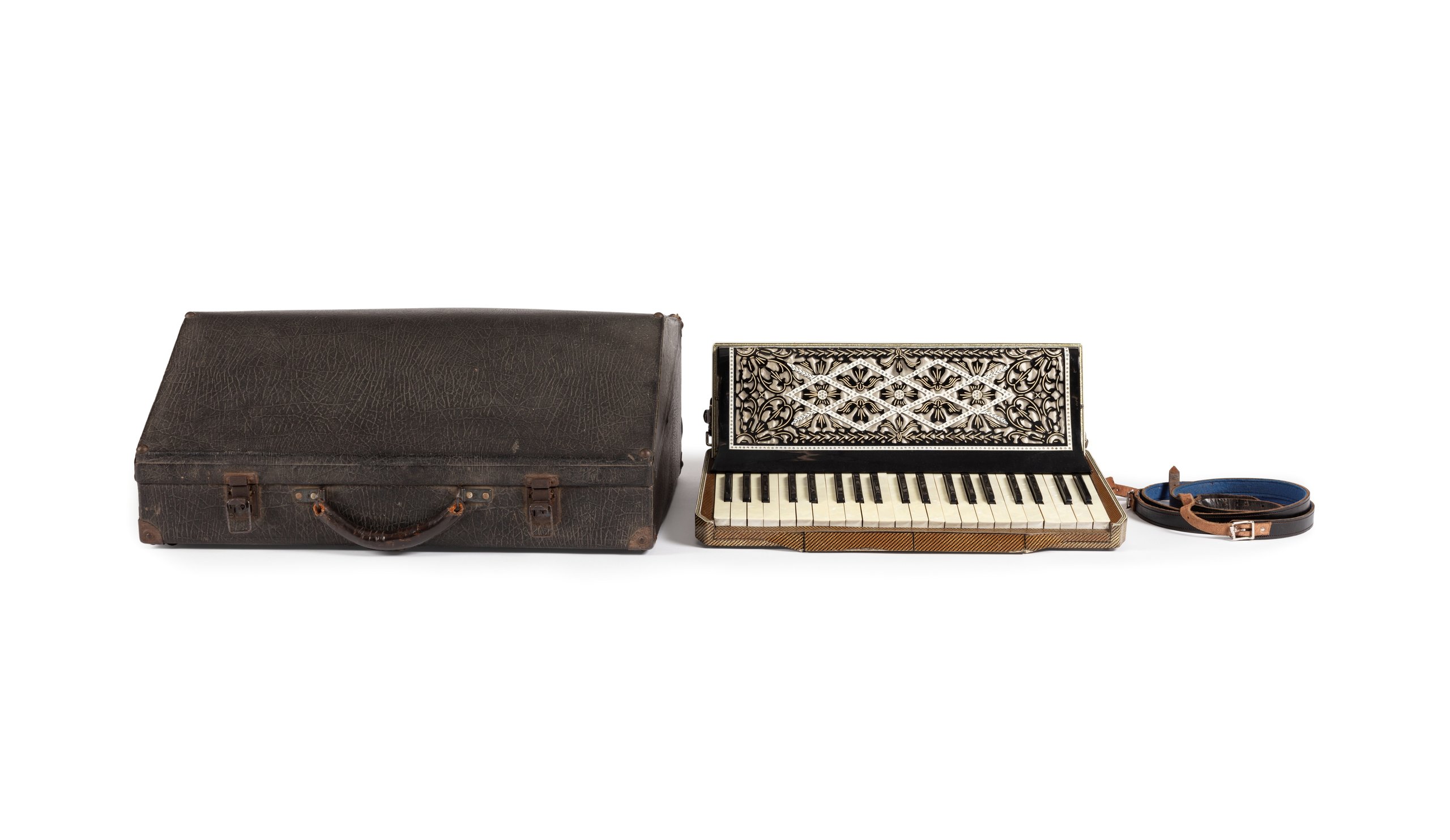 Piano accordion with case and strap made by Wurlitzer