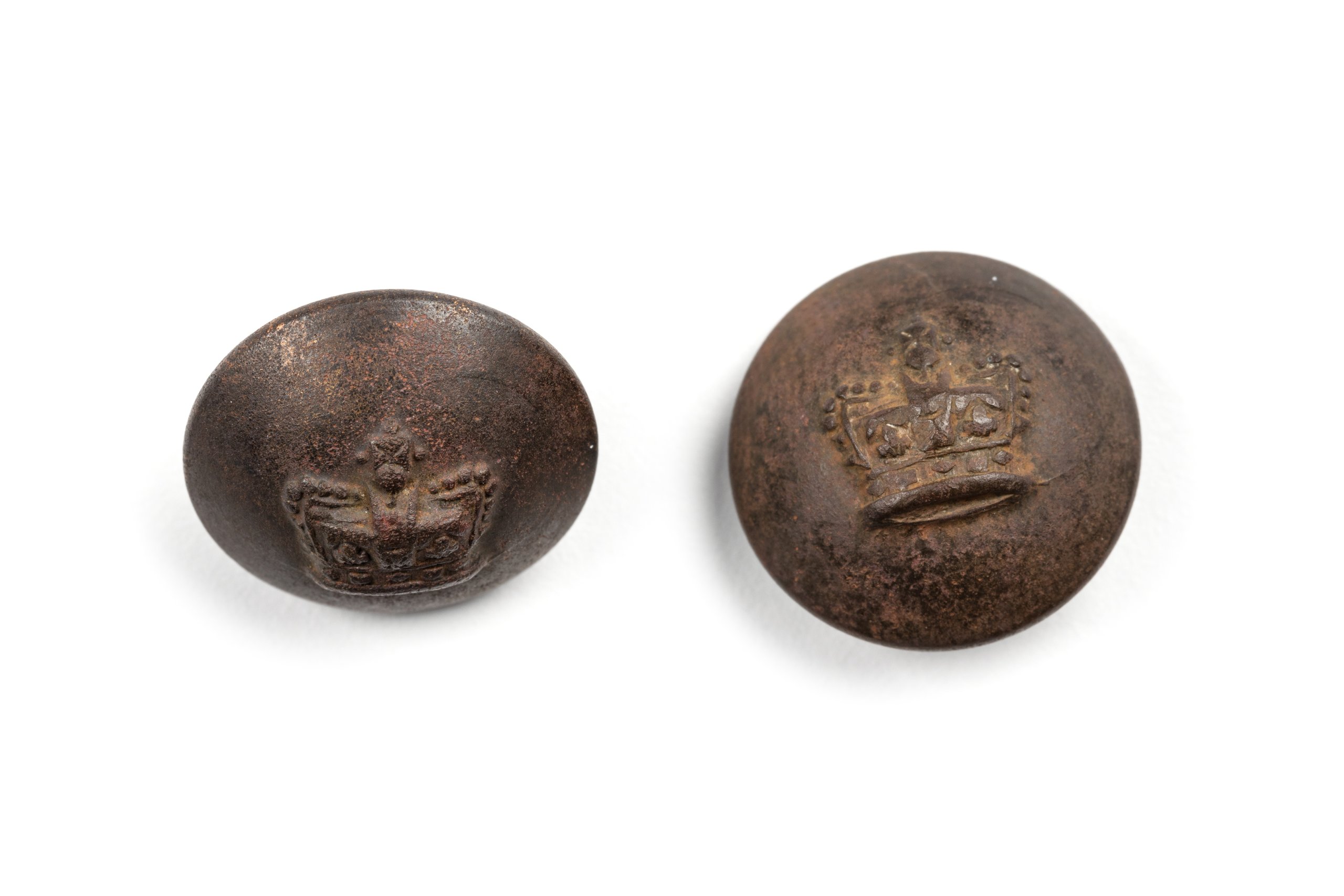 Two buttons embossed with the Queen Victoria crown