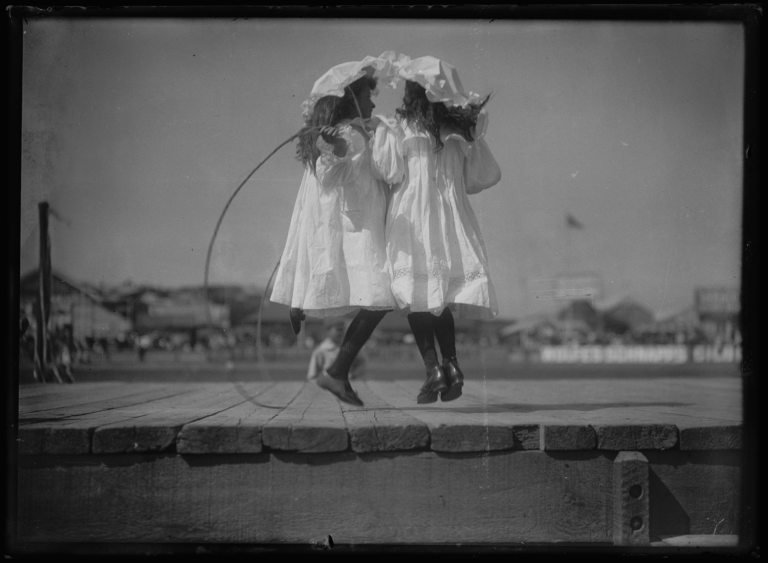 Photograph of girls skipping