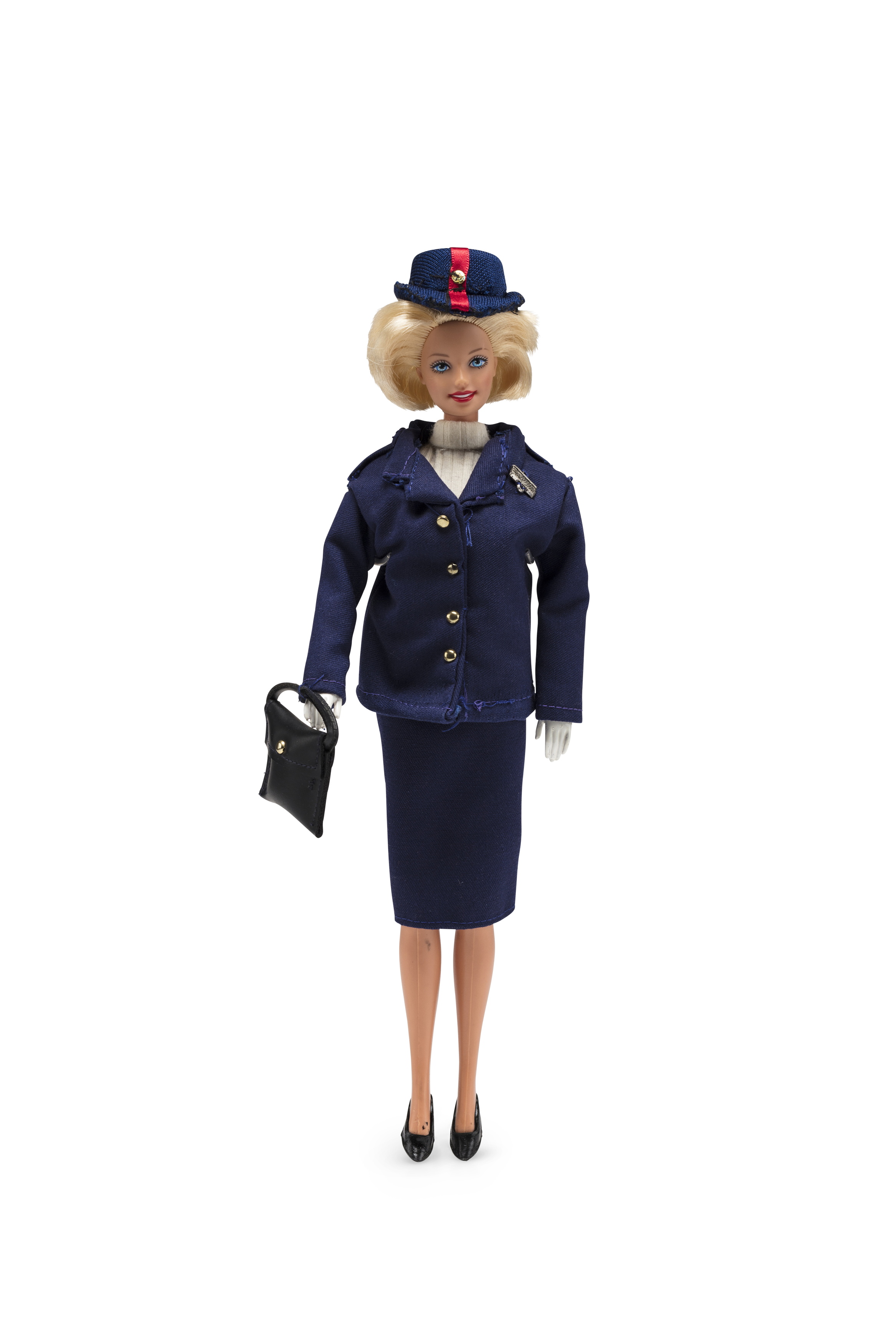 Barbie doll wearing Qantas uniform