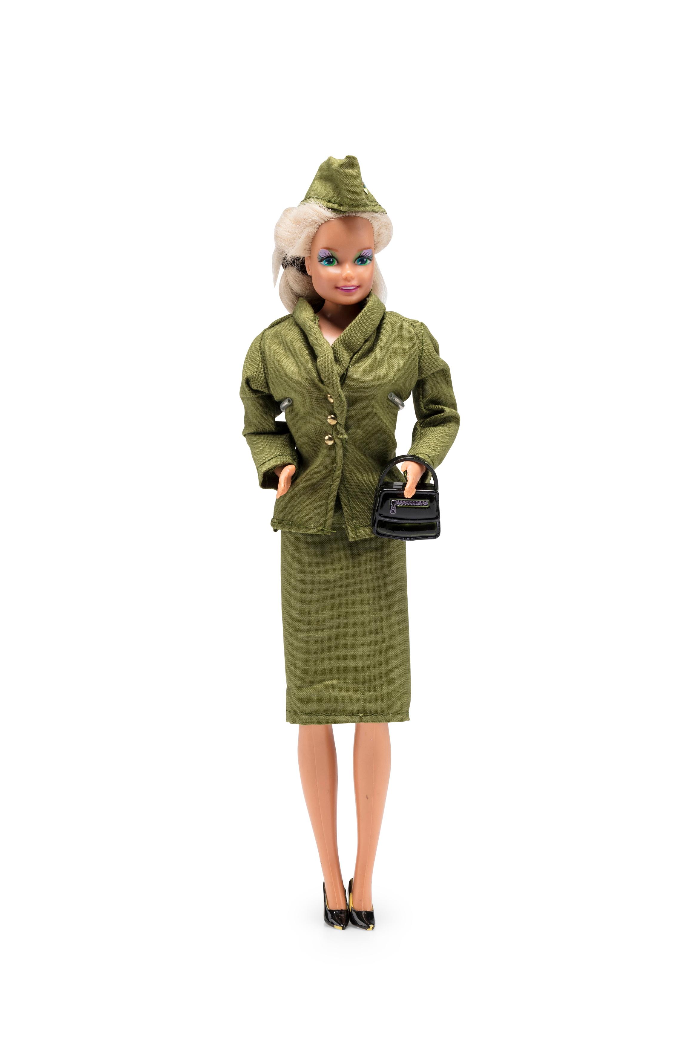 Barbie doll wearing Qantas 'jungle green' uniform worn by flight attendants 1959-1964