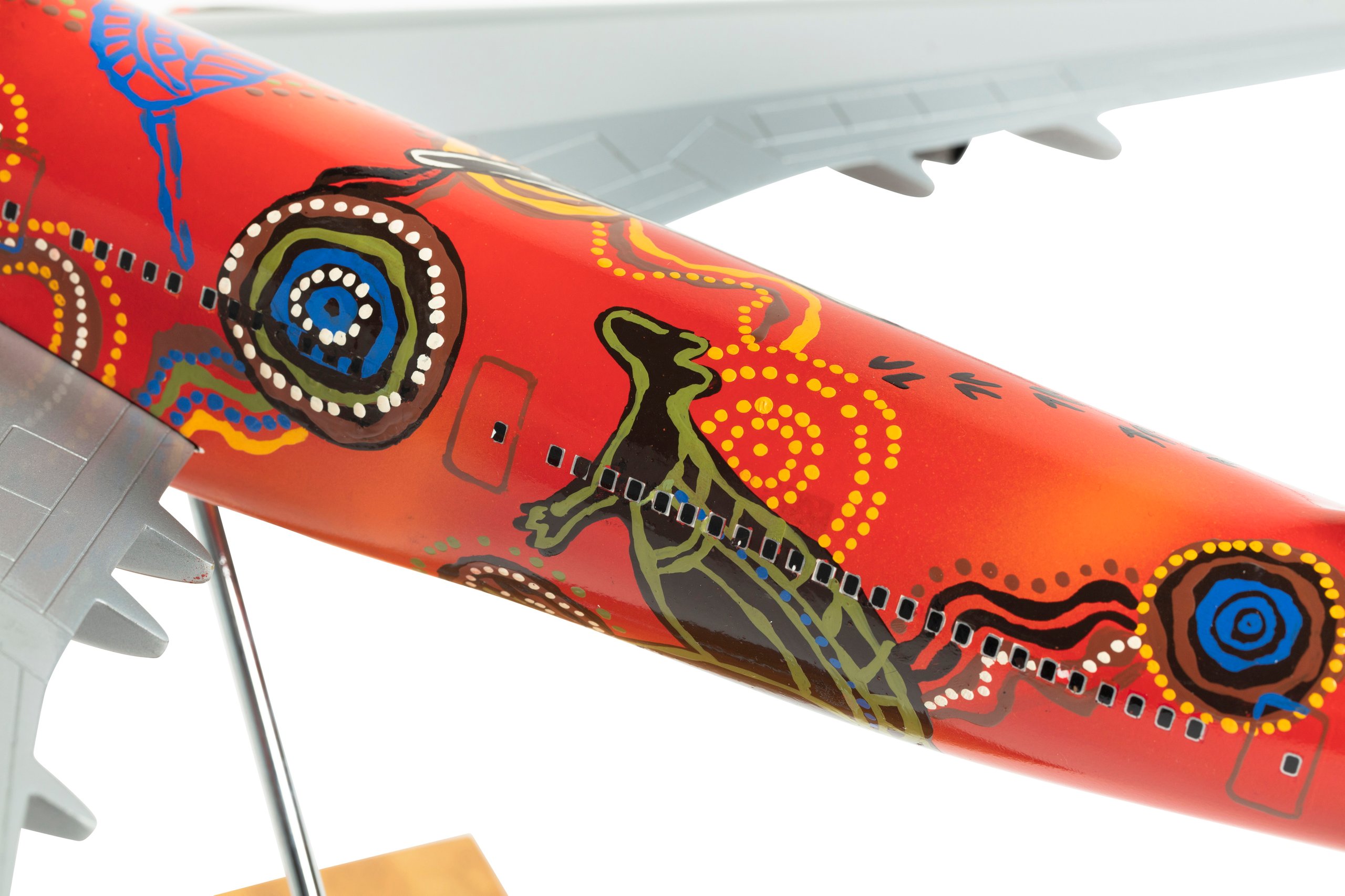 'Wunala Dreaming' decorated aircraft model and print by Balarinji Studio