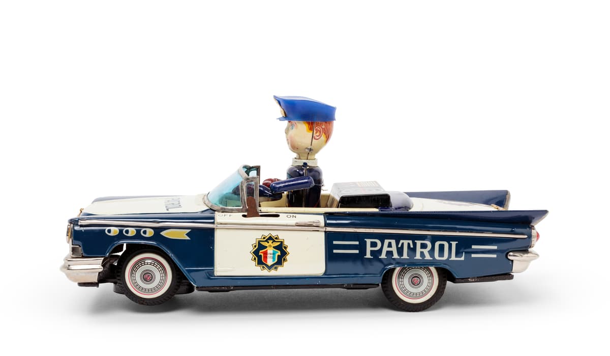 Powerhouse Collection - Buick Highway Patrol toy car and stand, 1960