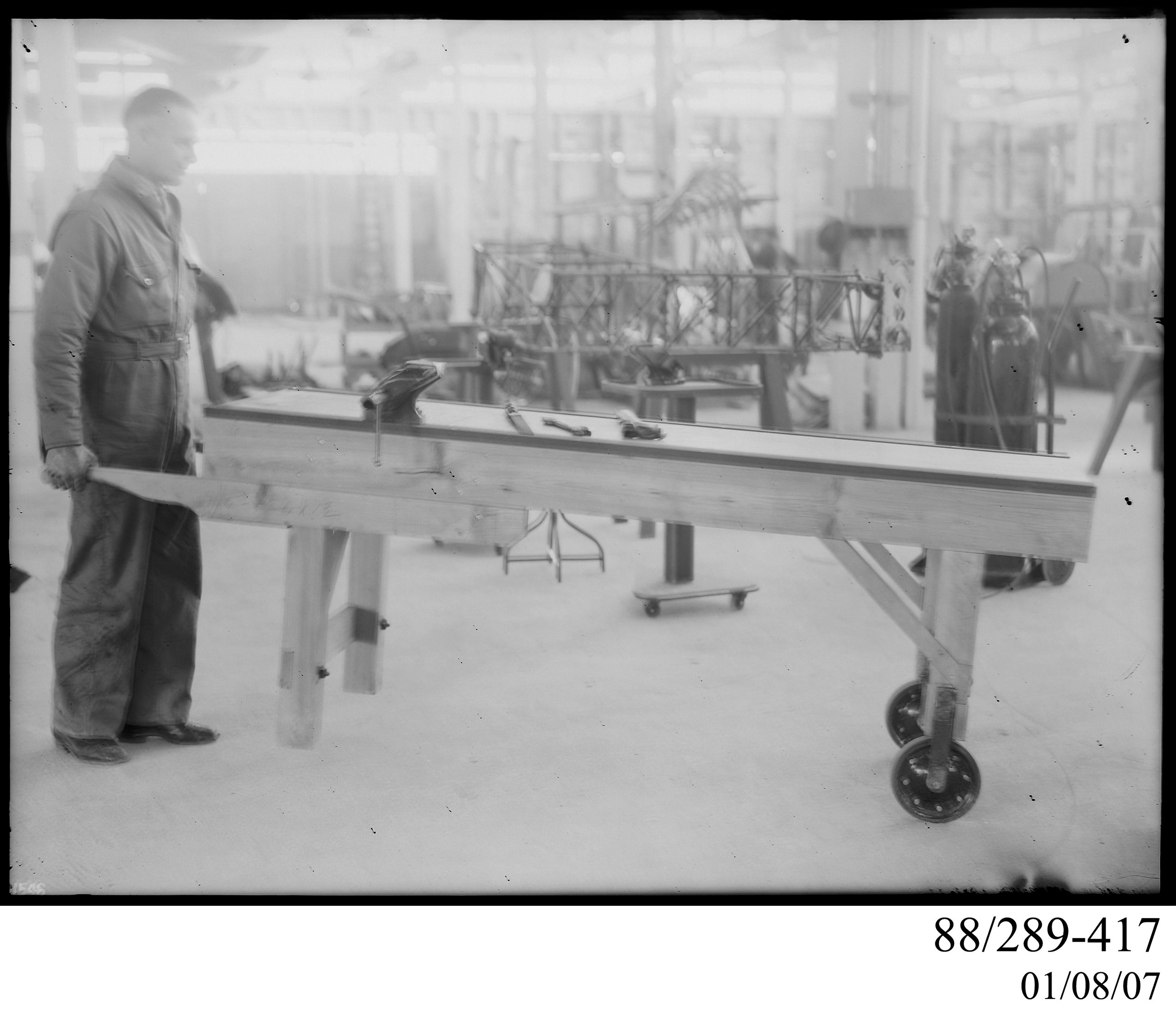 Glass plate negative of bench in aircraft workshop