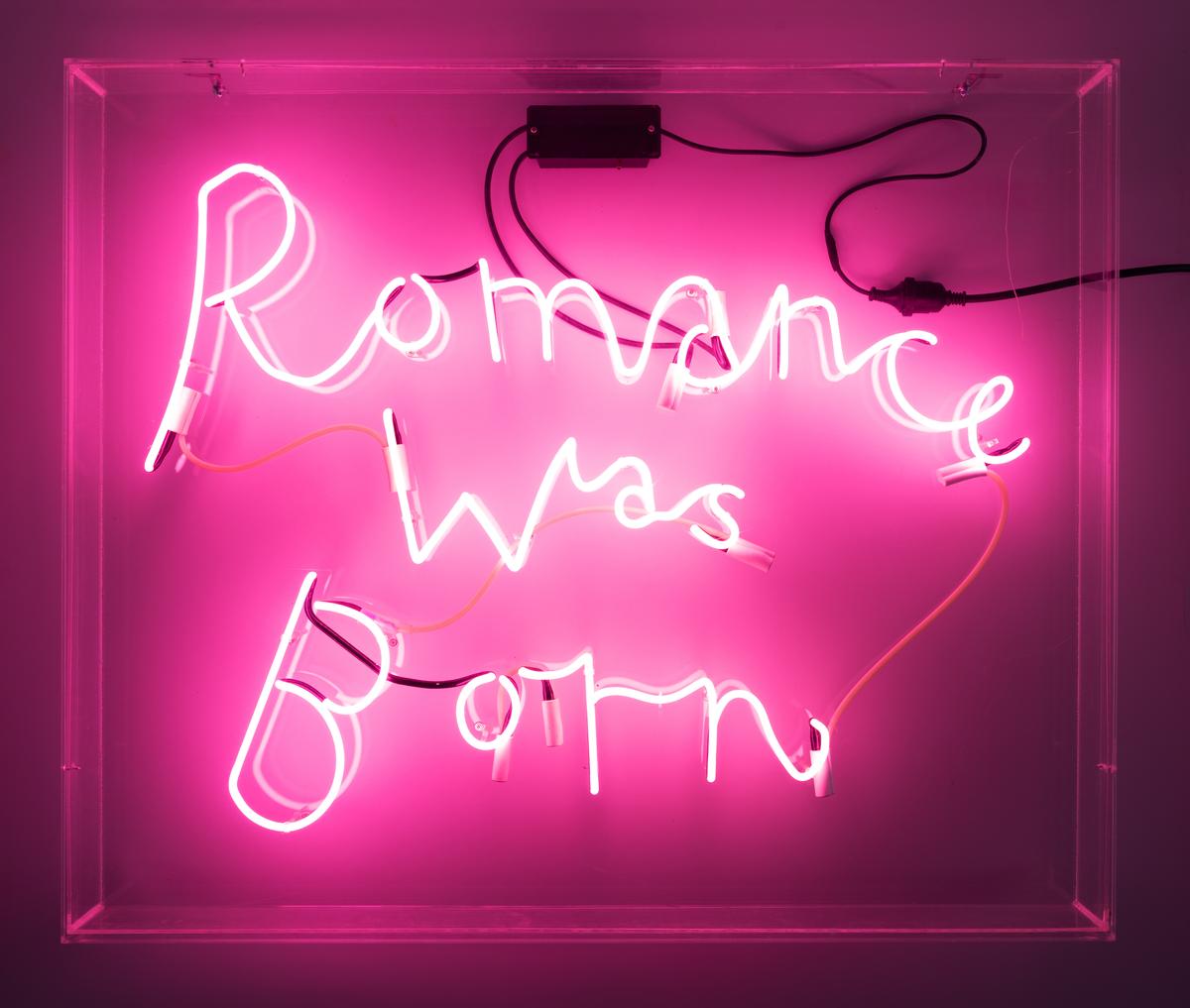'Romance Was Born' neon sign by Neolite Neon