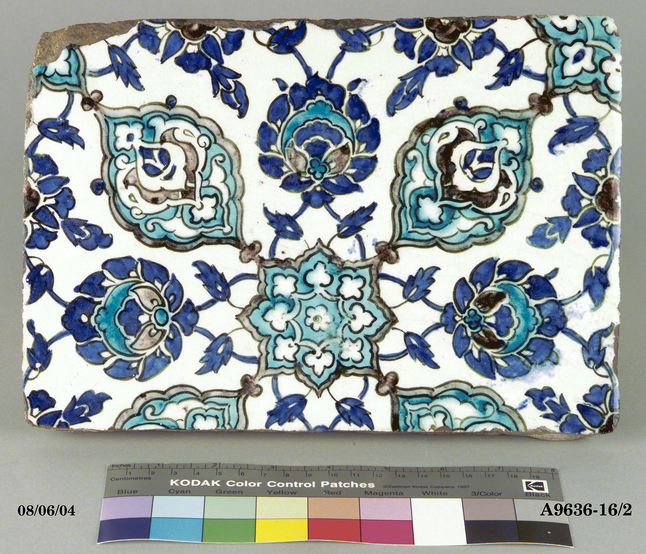 A pair of earthenware tiles from Damascus, Syria