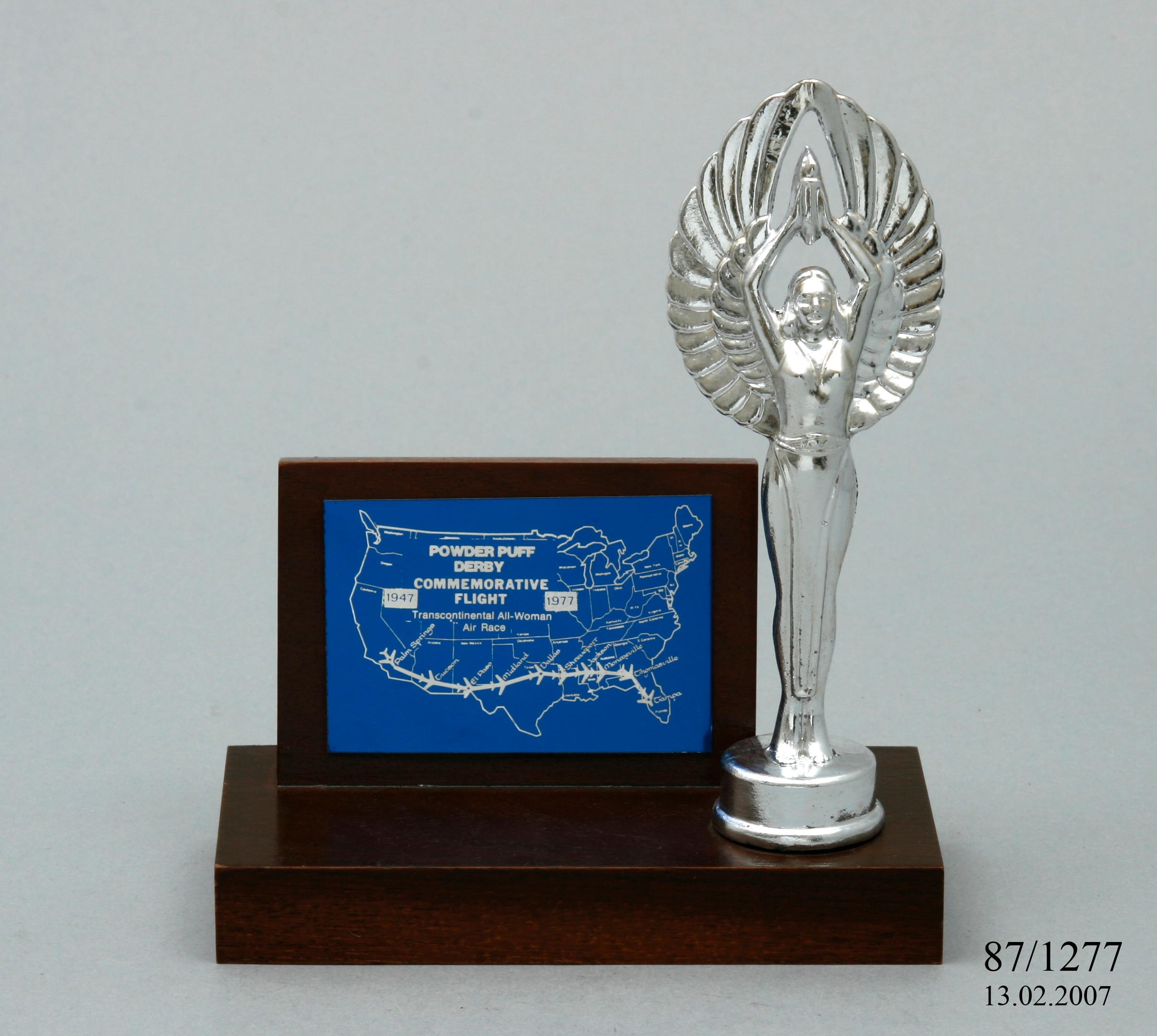 Powerhouse Collection Powder Puff Derby trophy from the Nancy