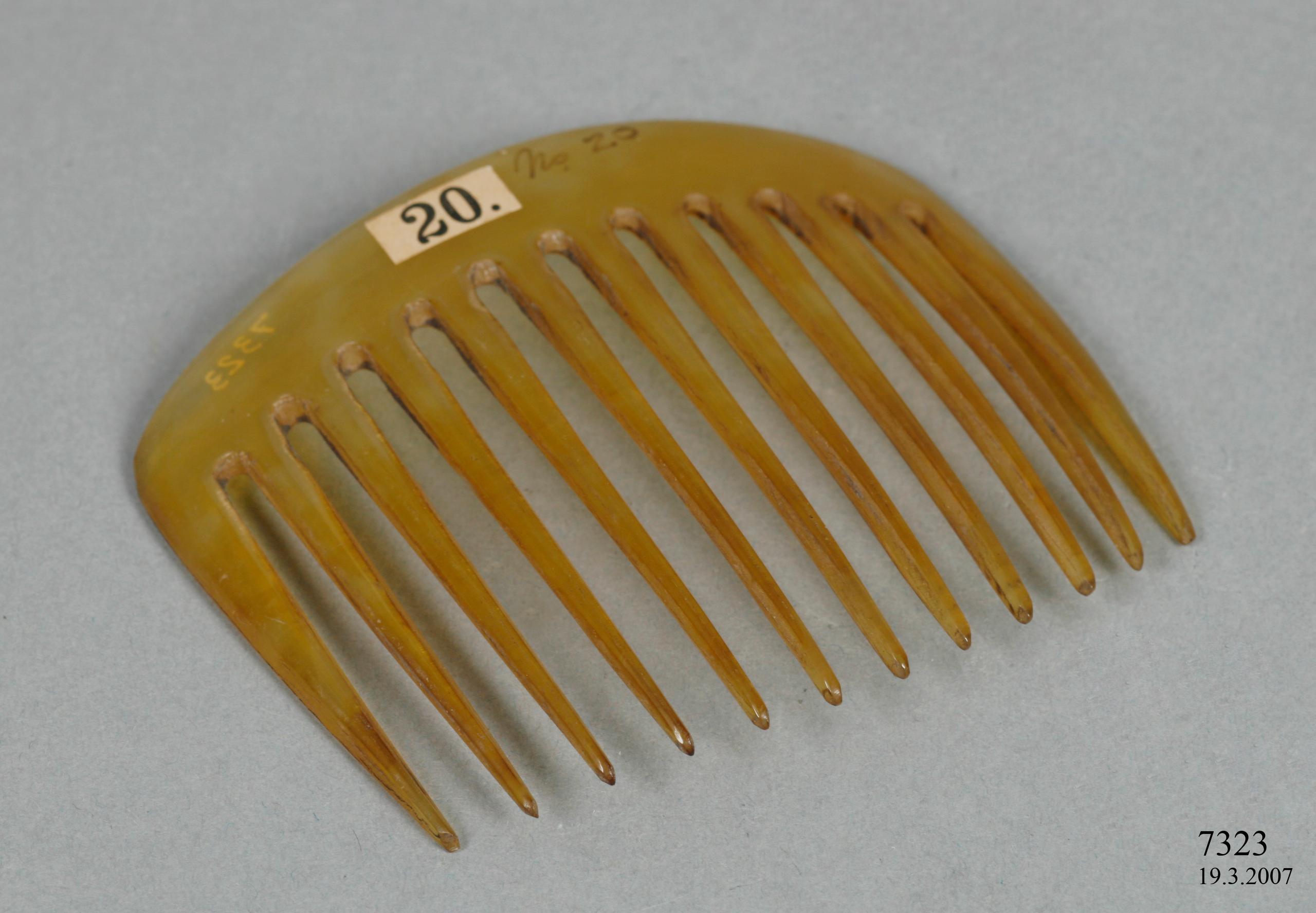Ox horn hair comb showing stages of production