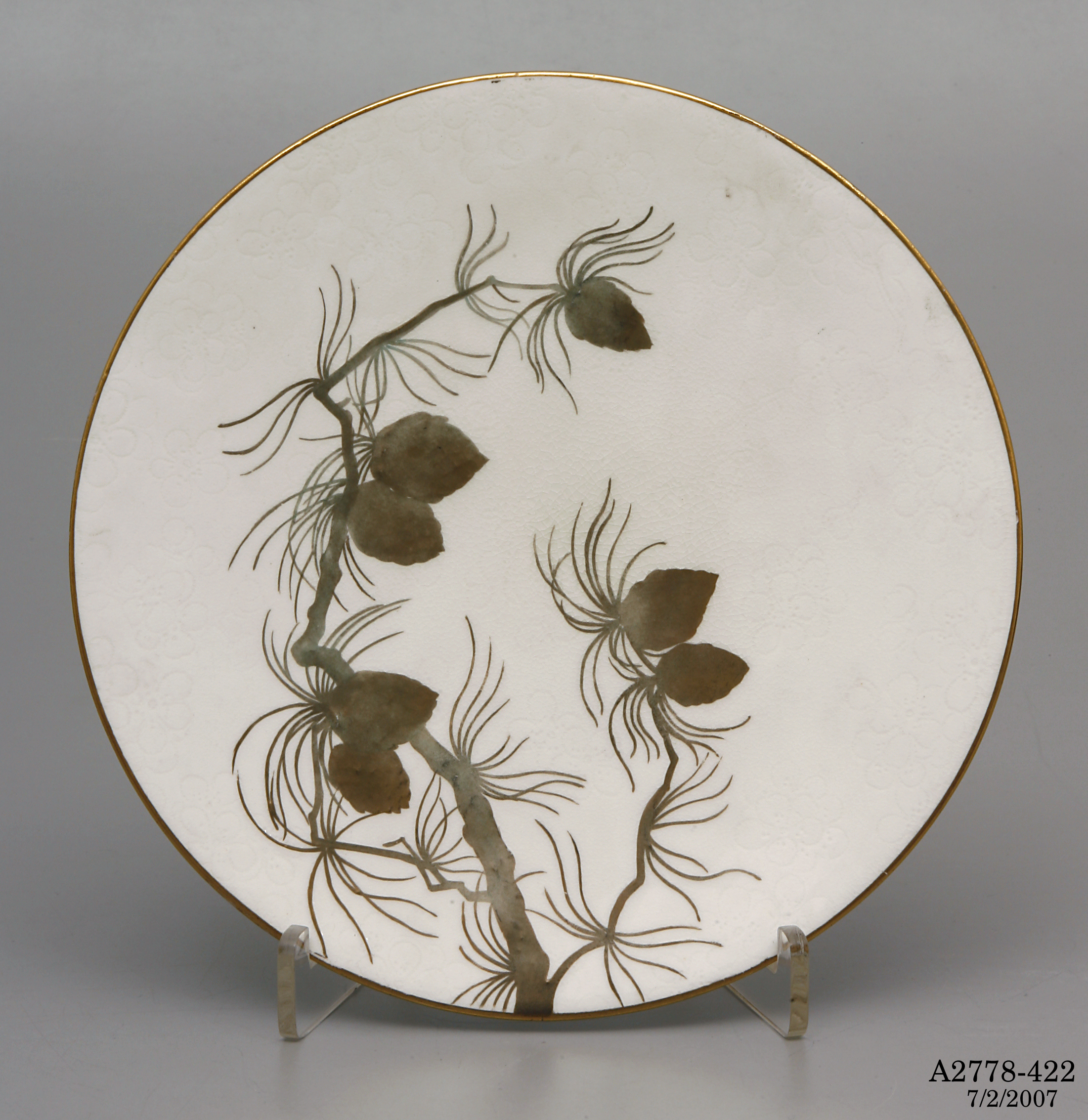 Doulton plate with pine cones