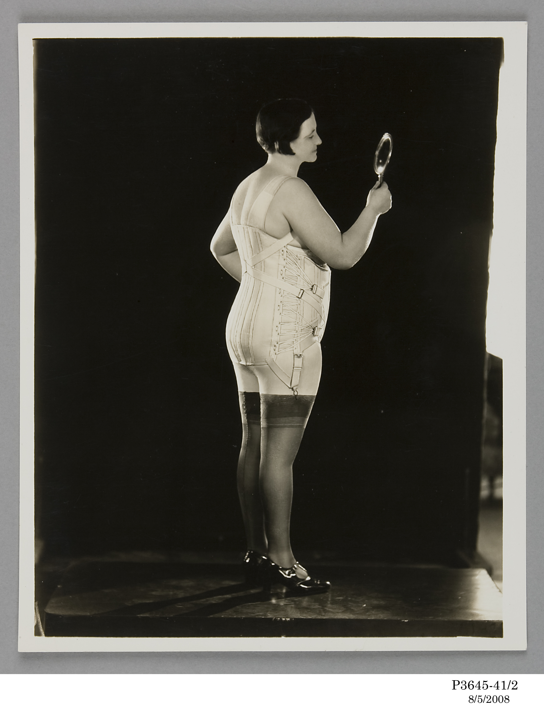 Photograph of a model wearing a Berlei corset