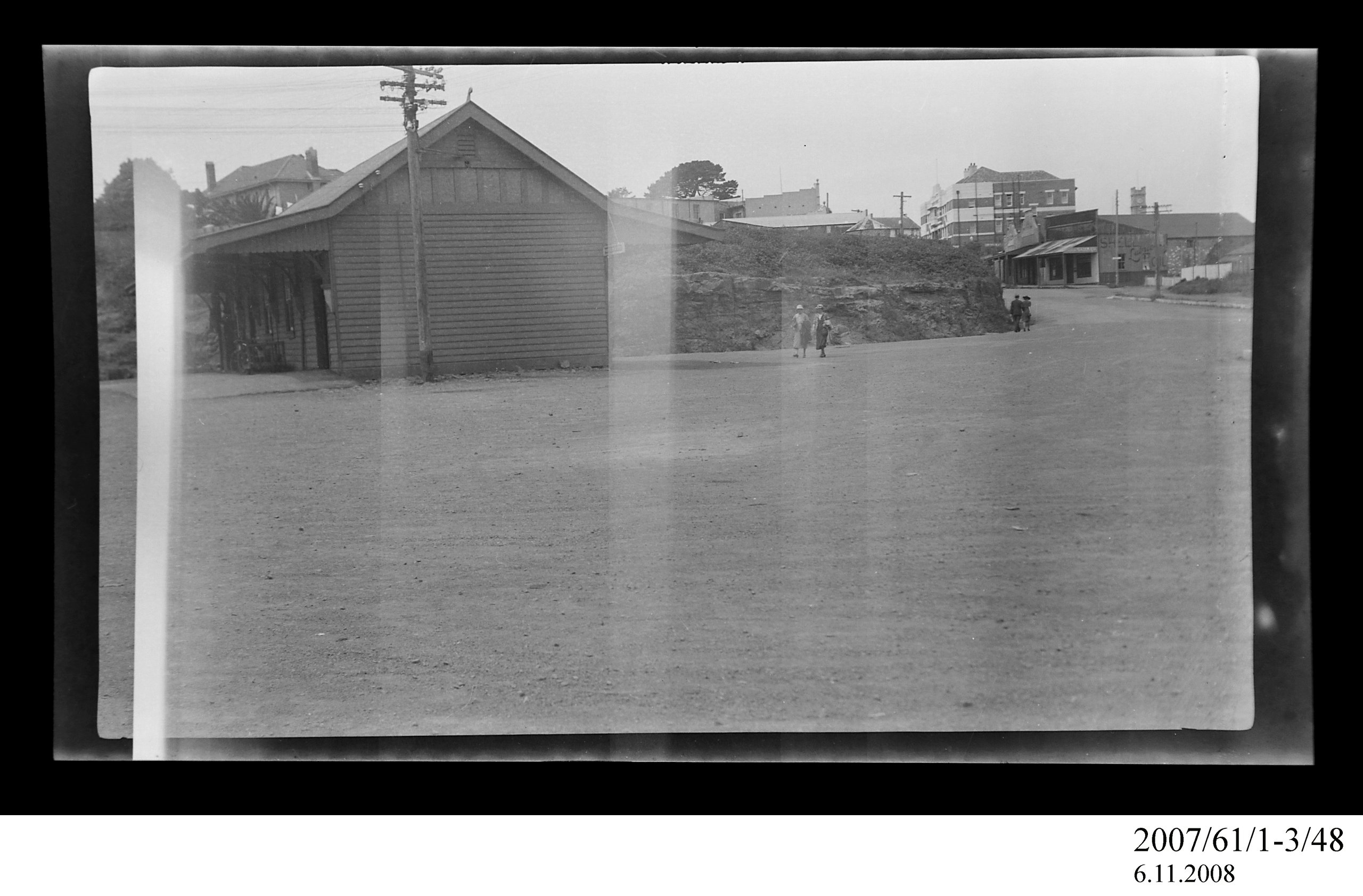 Negative of Crown Hotel seen from railway station, Wollongong