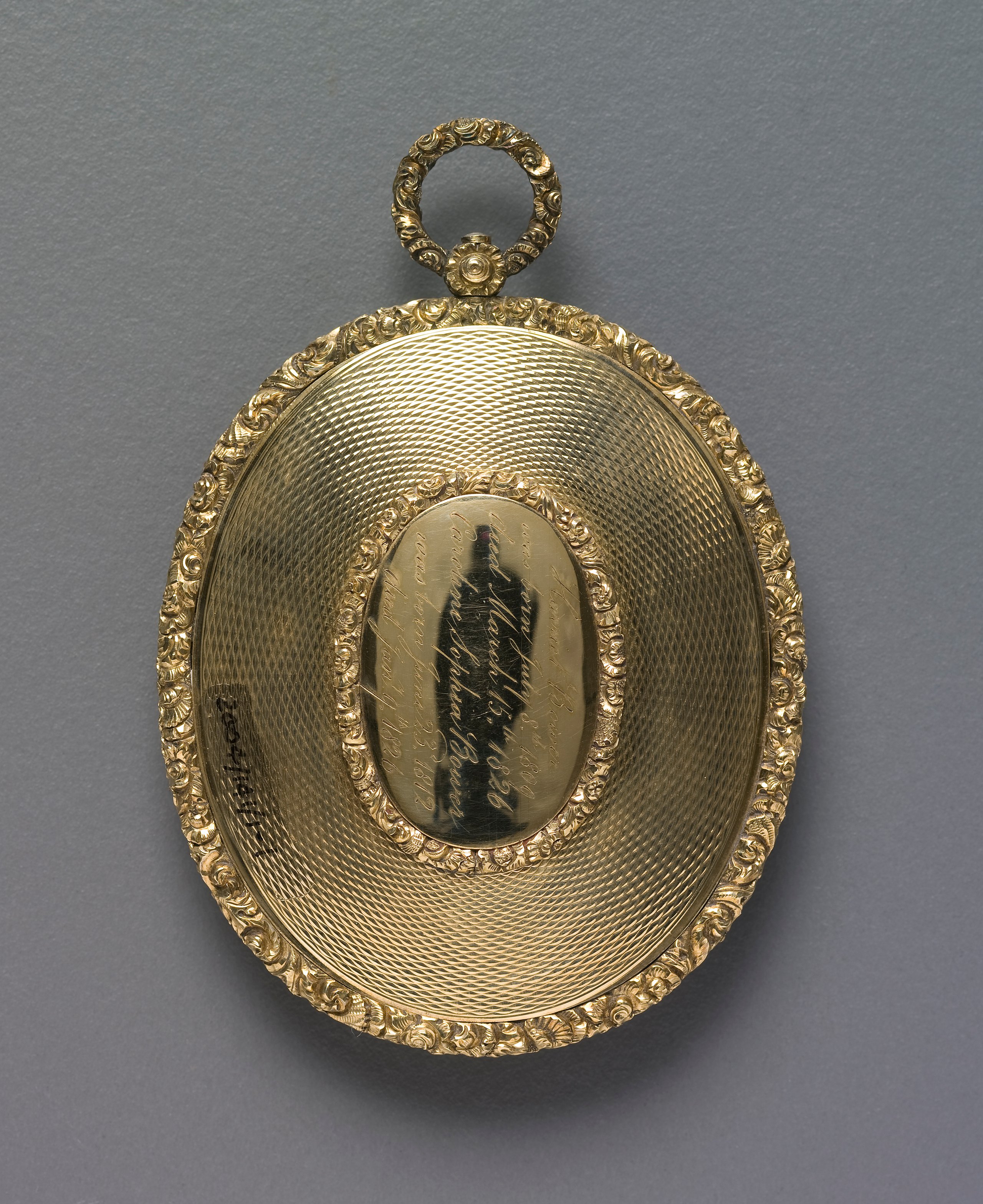 Mourning locket with hair of two sisters