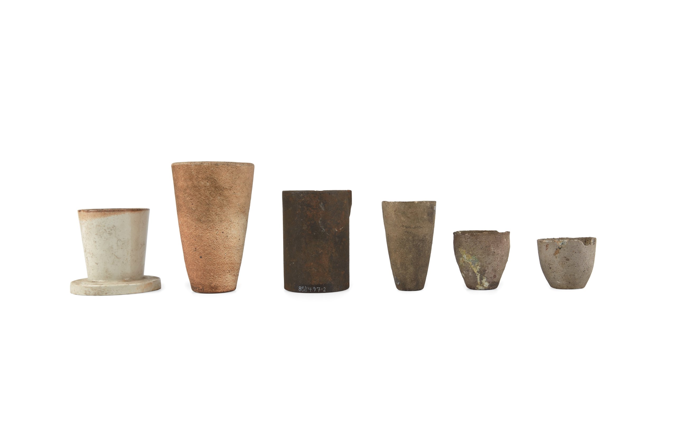 Six ceramic crucibles