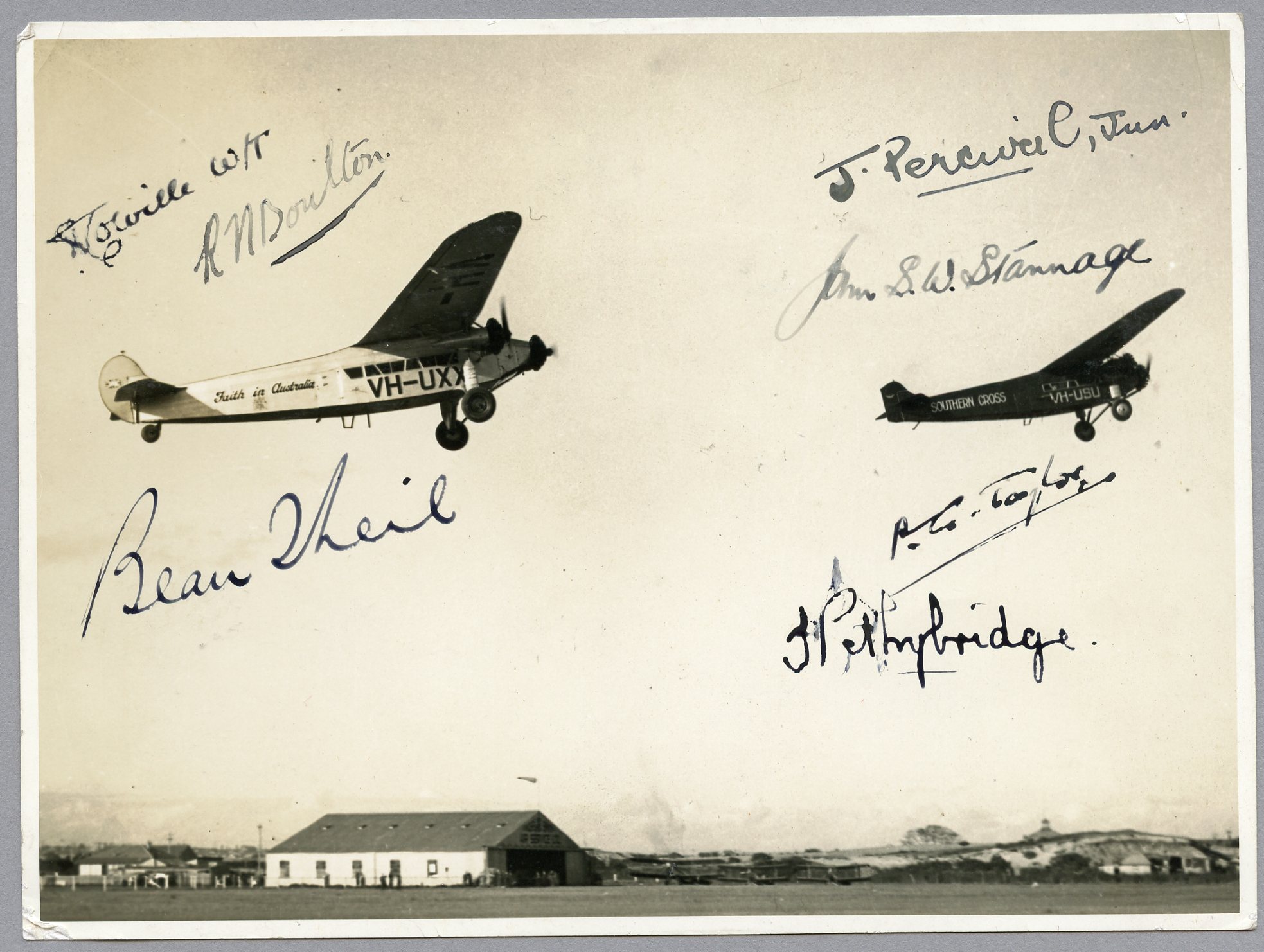 Photograph of the "Southern Cross" and "Faith in Australia" aircraft leaveing Mascot airport, Sydney, 1935