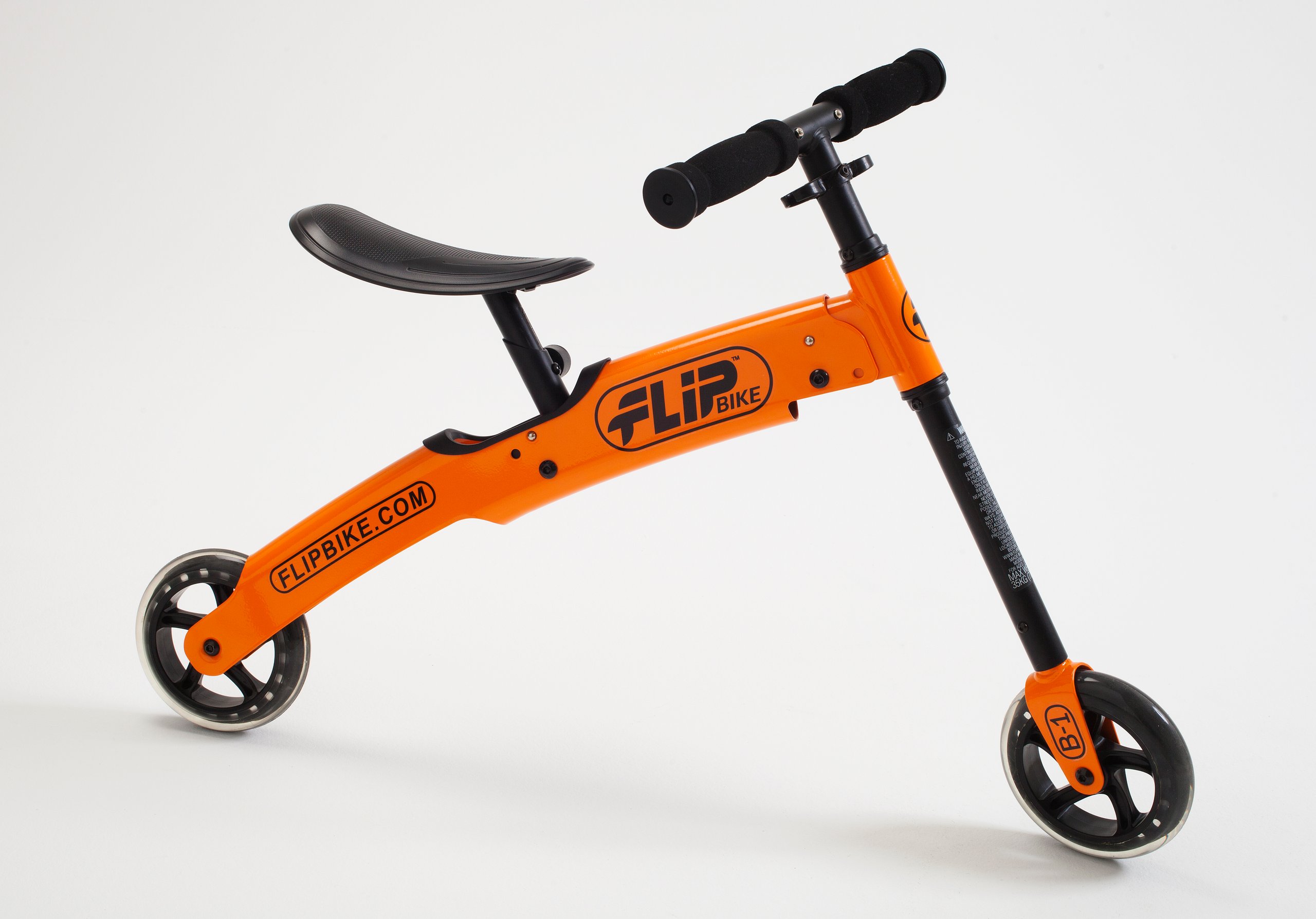 FlipBike folding balance bicycle with manual and packaging