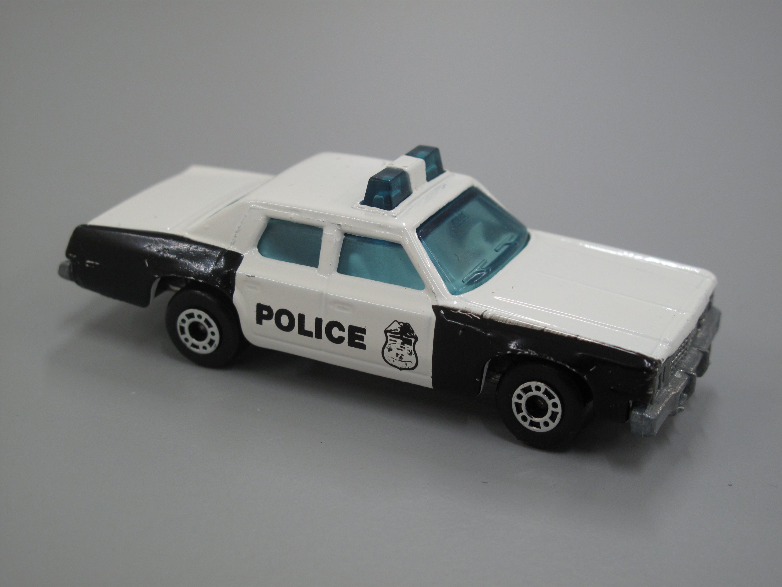 Toy matchbox Plymouth Gran Fury police car made by Lesney