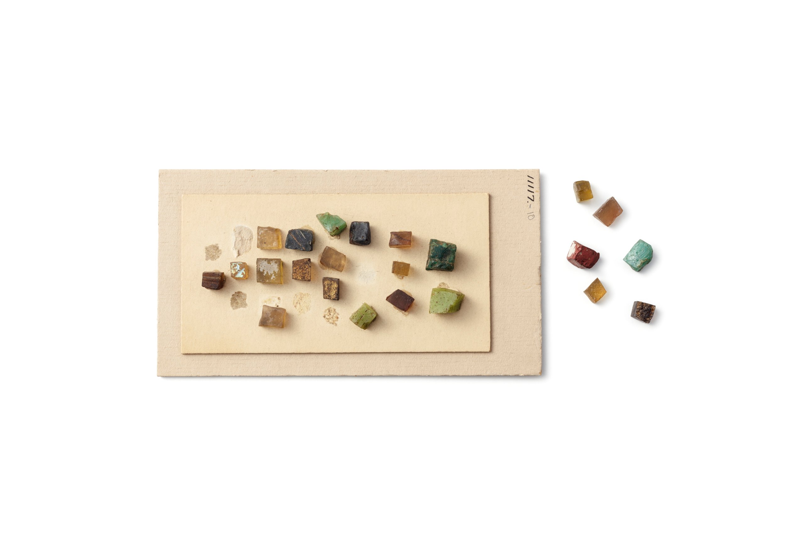 23 glass Tesserae from Ancient Egypt on card