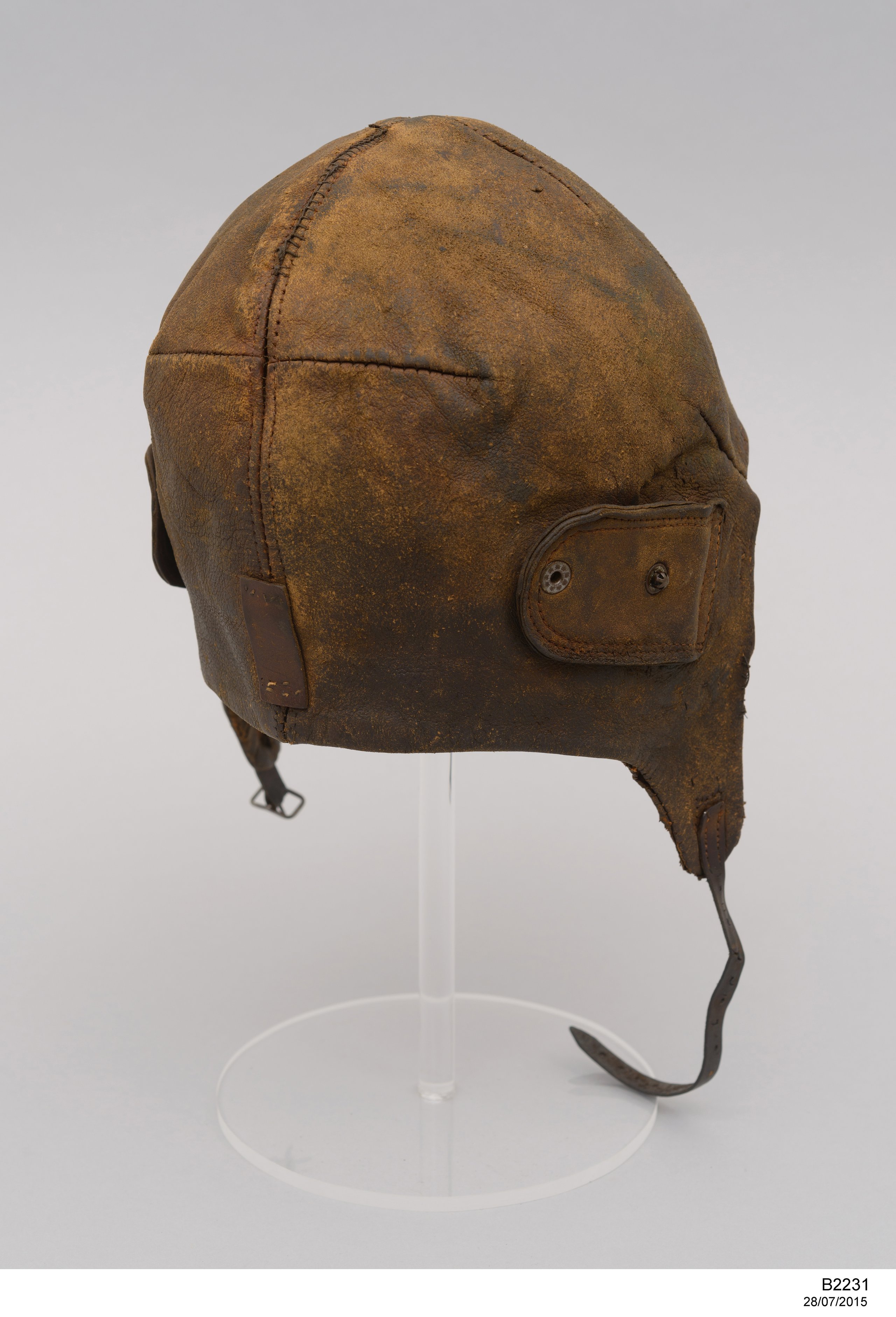 Flying helmet worn by Charles Kingsford Smith with fuel pipes from the 'Southern Cross'