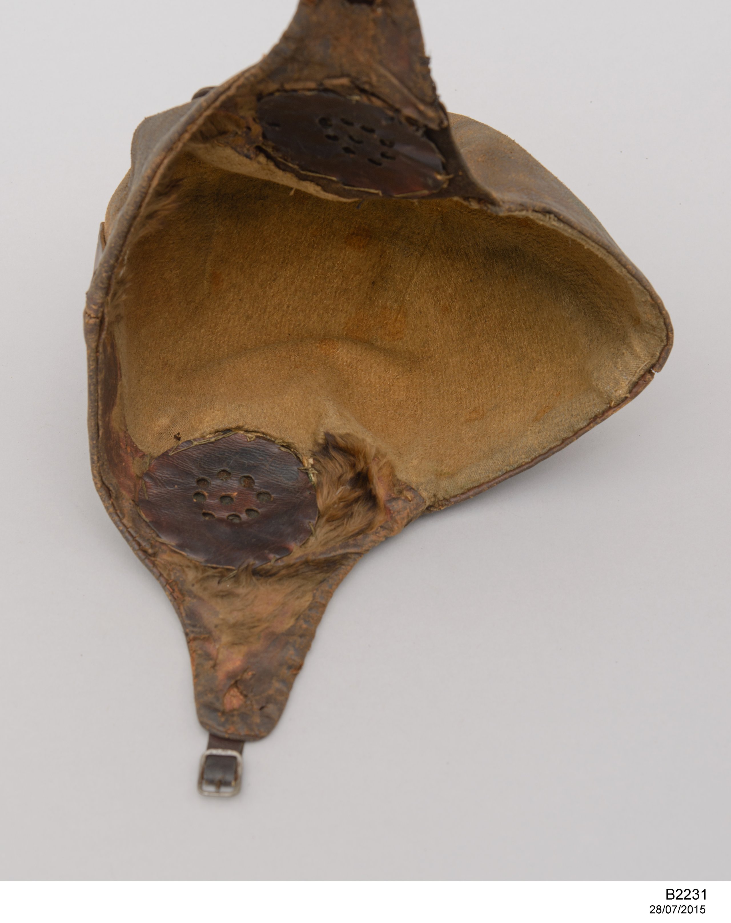 Flying helmet worn by Charles Kingsford Smith with fuel pipes from the 'Southern Cross'