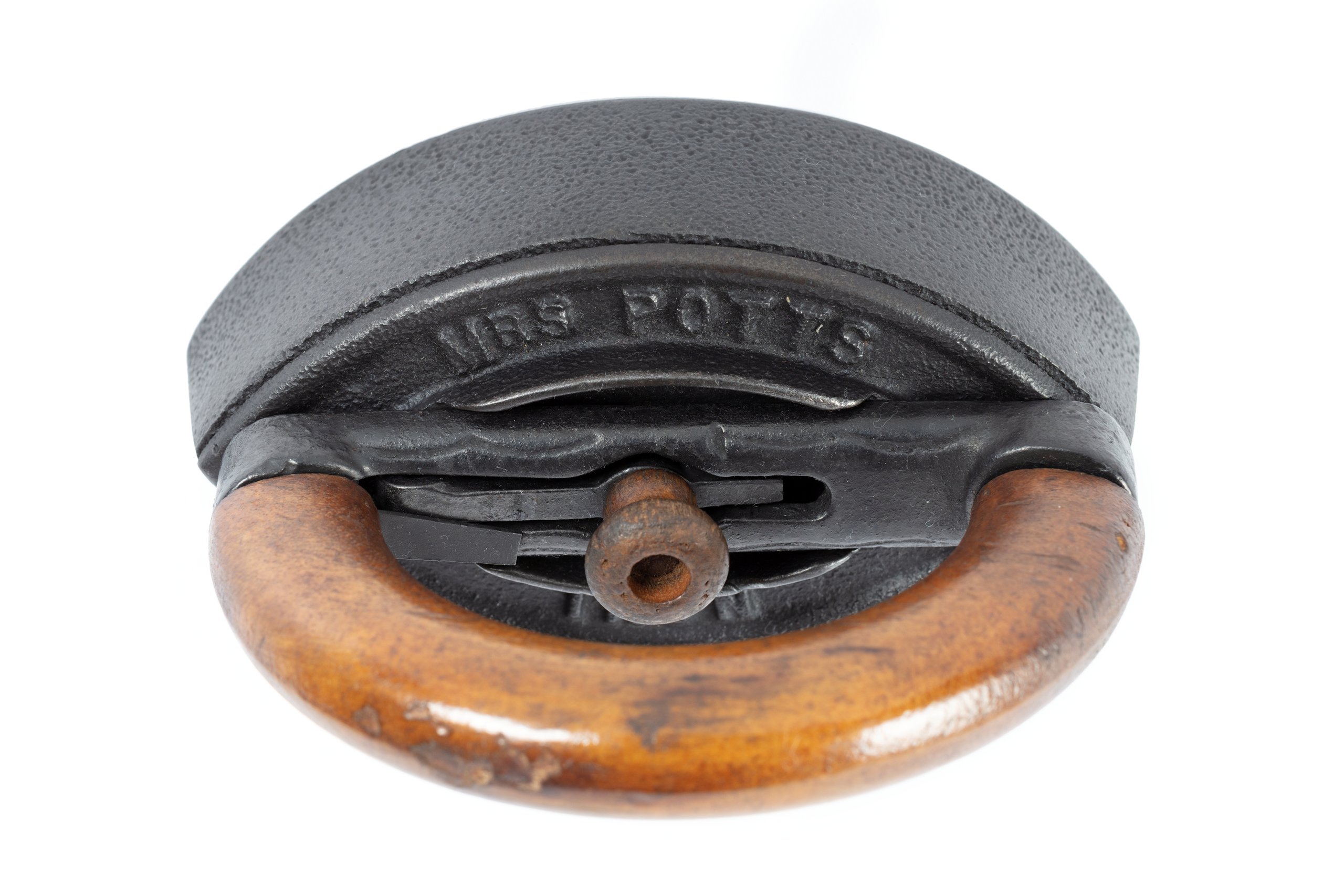 'Mrs Potts' Cold Handle Sad Irons' and trivet by Enterprise Manufacturing Co