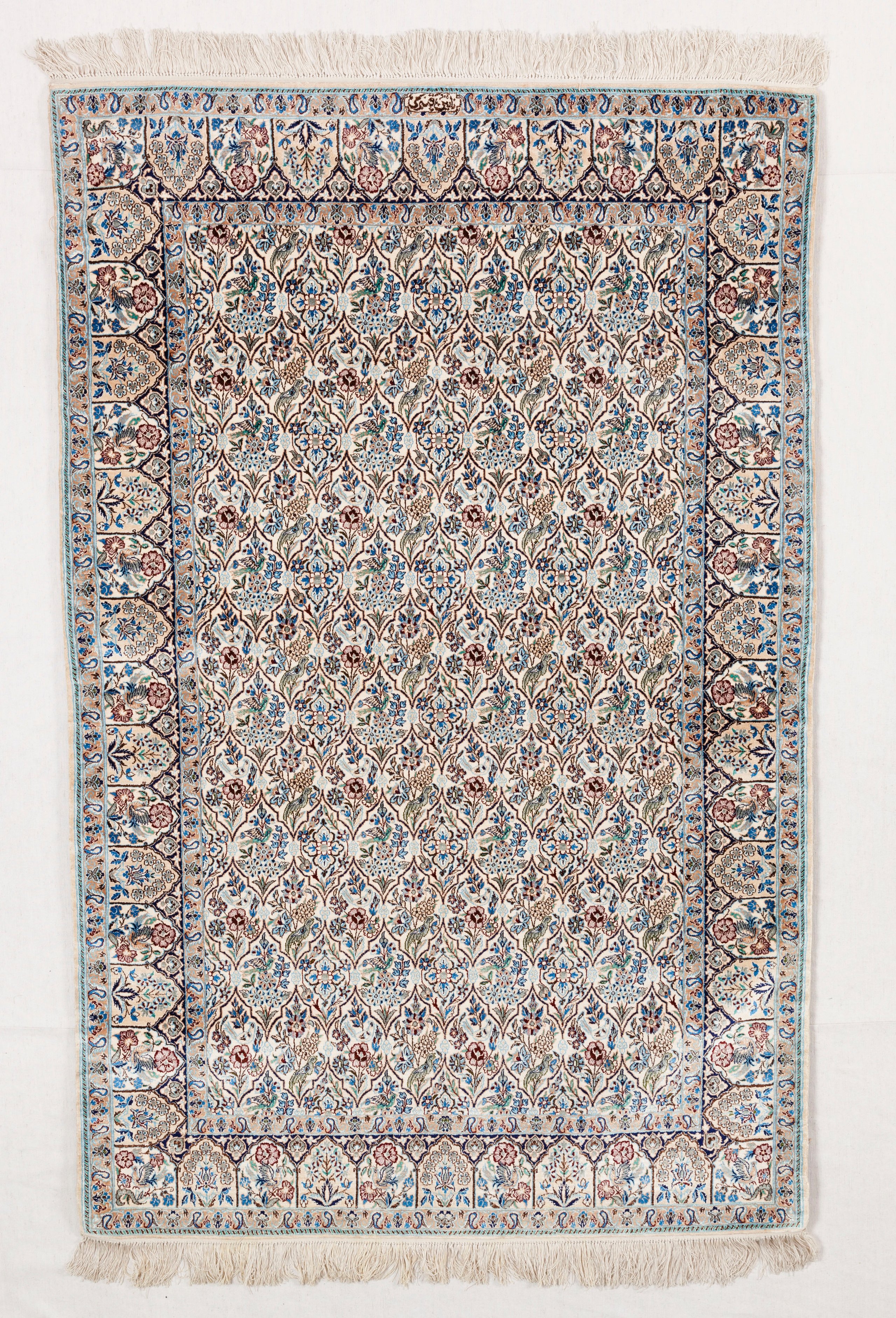 Hand knotted silk carpet by Haj Reza