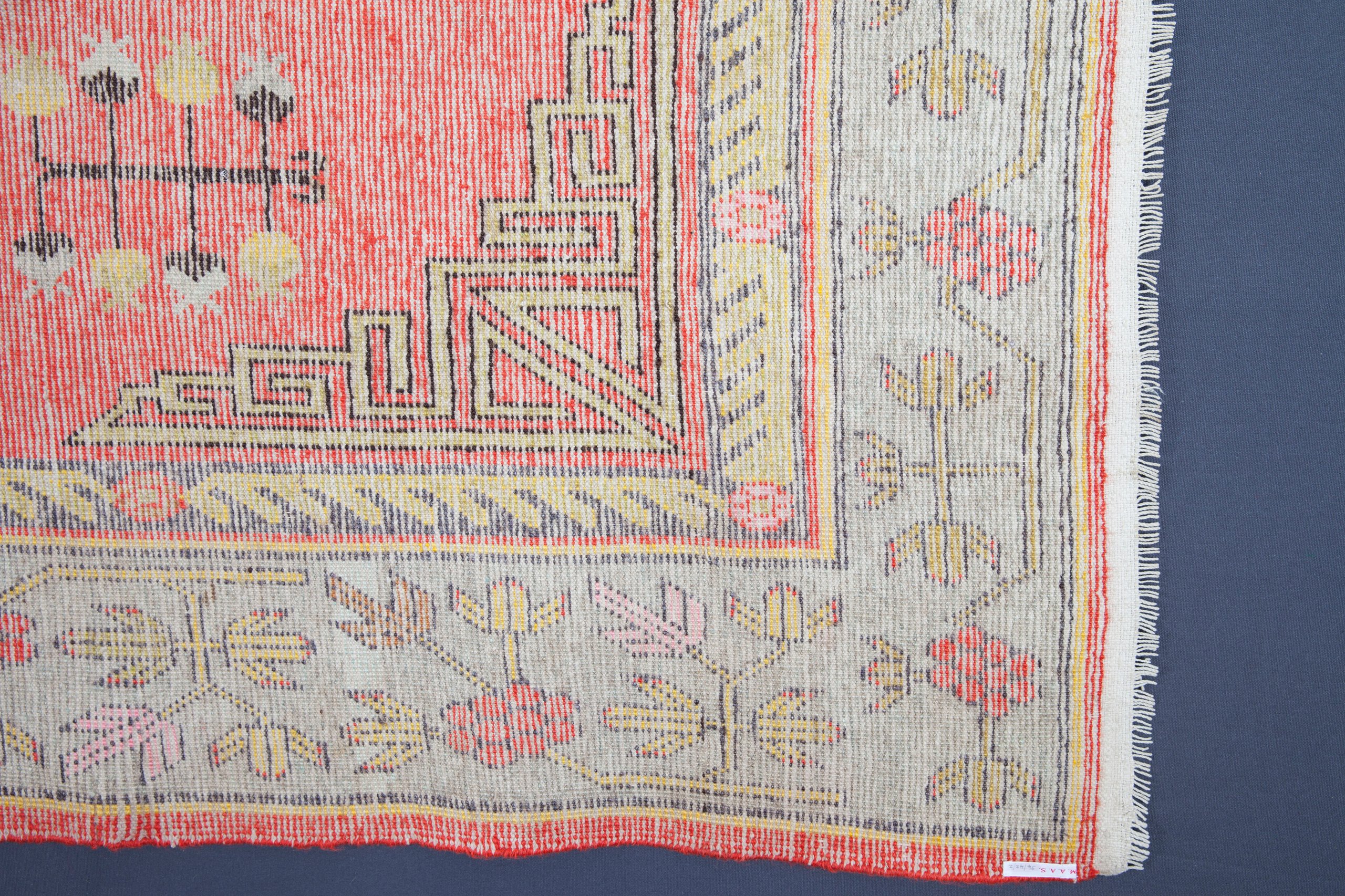 Knotted pile rug from Khotan